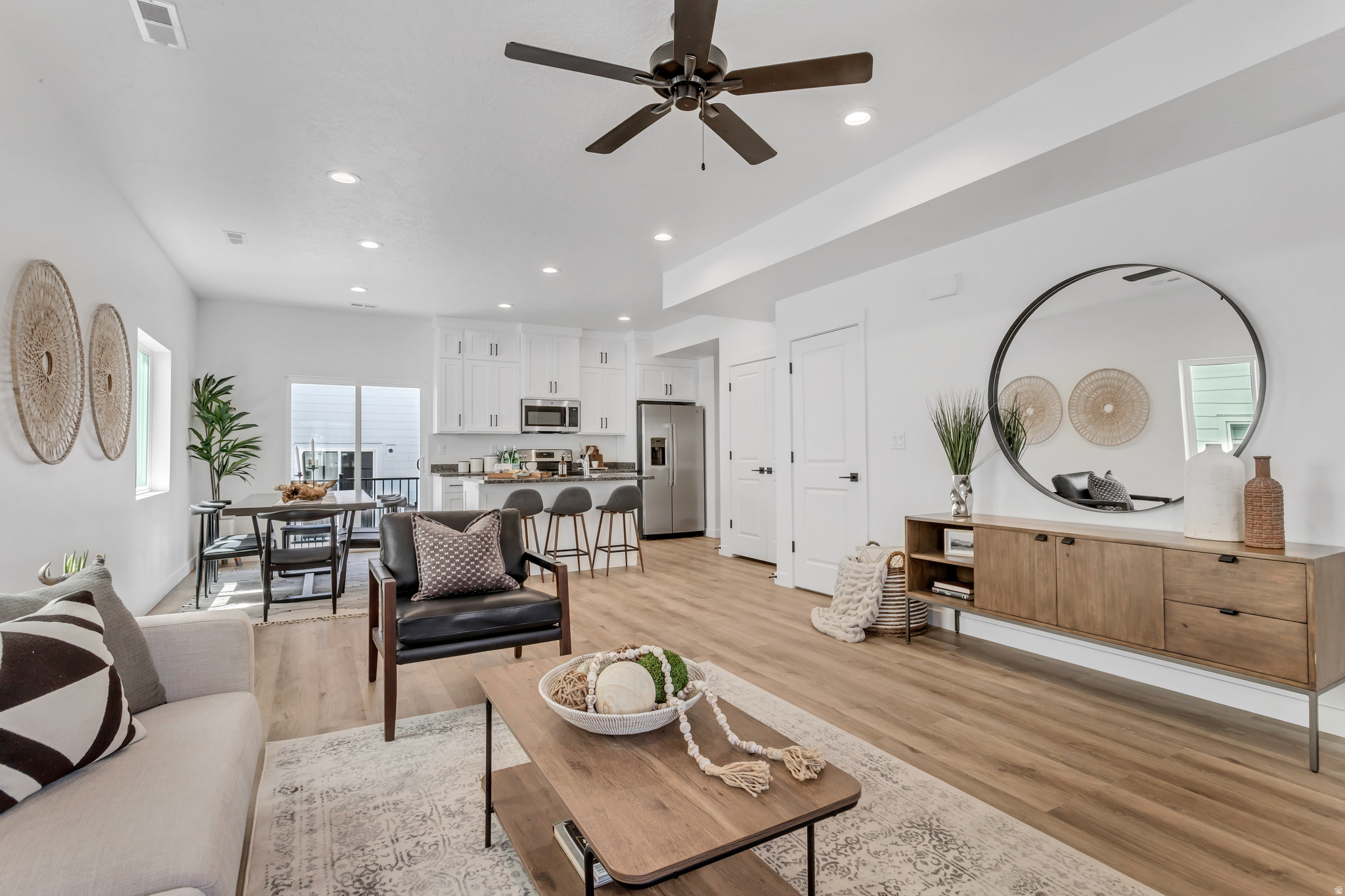 **PRICE DROP** Home was completed in 2023. Spacious, upgraded, and perfectly located - this stunning 5 bed, 3.5 bath home has everything you've been looking for. The massive primary suite creates a true retreat with an oversized walk-in closet and plenty of space to unwind. Large windows throughout the home bring in abundant natural light, highlighting the beautiful granite countertops and brand-new stainless steel appliances including a refrigerator, range, microwave, dishwasher, and farmhouse sink. The open layout features a large kitchen pantry, generous living spaces, and a 2-car garage. An added bonus is the separate-entry ADU setup, offering excellent potential for rental income, multigenerational living, guest space, or added flexibility for owners looking to offset their mortgage. Enjoy access to a private pickleball court shared by only 18 homes, plus a brand-new park within walking distance. Located just 6 minutes from BYU and 15 minutes from UVU, this home combines comfort, convenience, lifestyle, and income potential in one incredible package. Square footage figures are provided as a courtesy estimate only.  Buyer is advised to obtain an independent measurement.