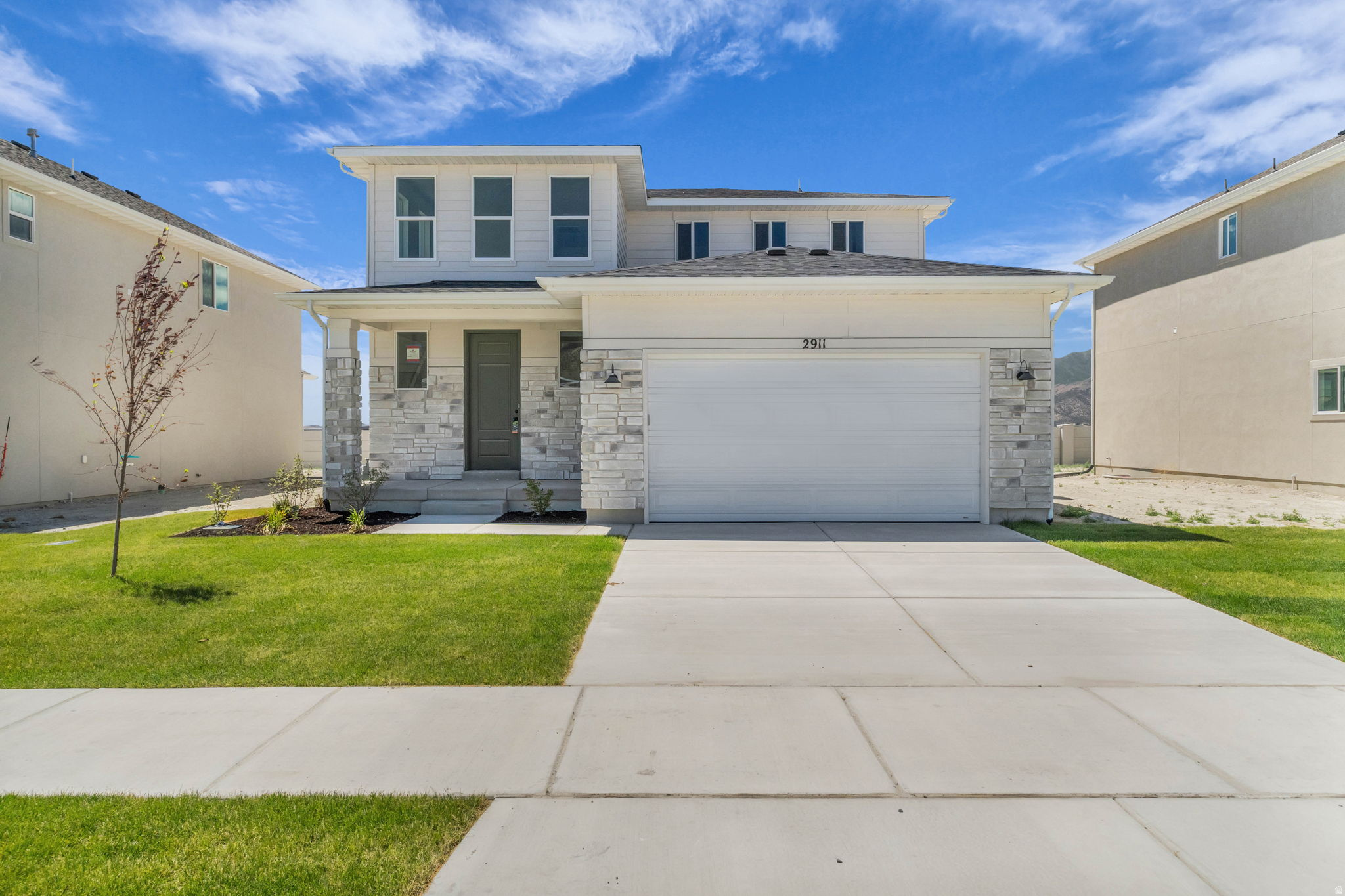 AMAZING $20,000 INCENTIVE TOWARDS CLOSING COSTS, RATE BUYDOWN, OR PRICE REDUCTION REGARDLESS OF LENDER! (Talk to agent for conditions). Must-see Parkway Fields Community in Eagle Mountain! Move-in ready! This beautiful home built by Flagship Homes features 4 bedrooms, 2.5 bathrooms, quartz slab countertops, painted cabinets, laminate flooring on the main level, a large loft on the 2nd floor, landscaped front yard and 2 car garage. The backyard can be landscaped for an additional charge and has a decorative concrete wall on the back boundary. Open 2-story front entrance. The primary bedroom is on the main level and has a vaulted ceiling, large walk-in closet, and dual sinks with a separate tub/shower. With an unfinished basement, this home provides space for storage and room to grow. (If preferred, basement can be finished for an additional charge.) Call for more information or stop by our model home at 1546 E. Starling Lane, Eagle Mountain for a tour. Model home hours: Monday-Saturday 11 AM - 6 PM. Buyers to verify all information. Square footage is from house plans.