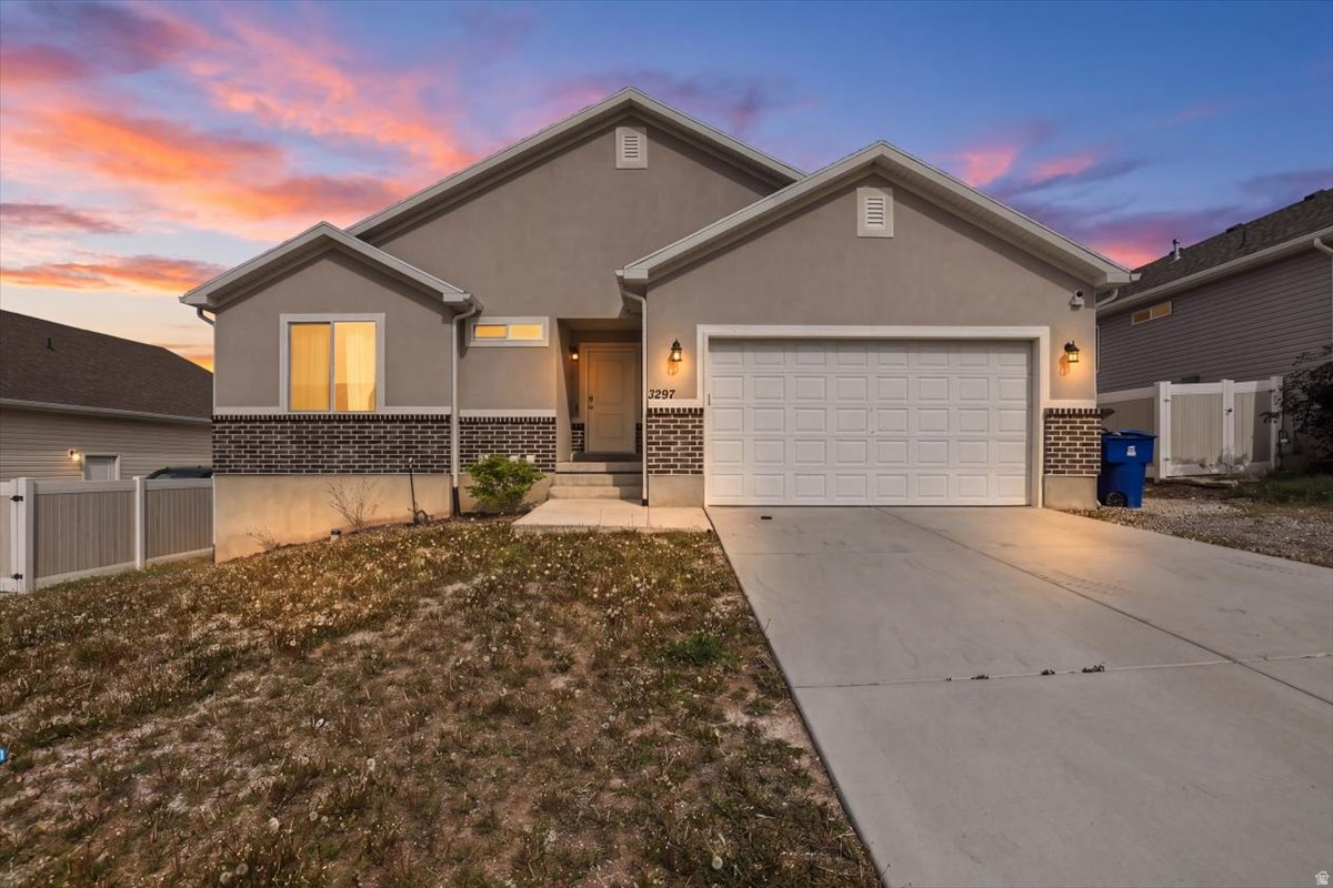 Updated price. Come see this beautiful, value added home.  Basement complete with kitchen, master suite, laundry, full walkout, etc. - must come see this incredible potential. Beautiful views of the Oquirrh and Wasatch mountains. Quiet location on a road that doesn't get much traffic. Close to HWY 201's west most entrance for easy access to eastbound travel. Also close to HWY 111 for easy access to Westbound travel on HWY 201. Well designed floor plan. Solar panel payoff & any seller's contributions to closing costs are negotiable with the right offer.