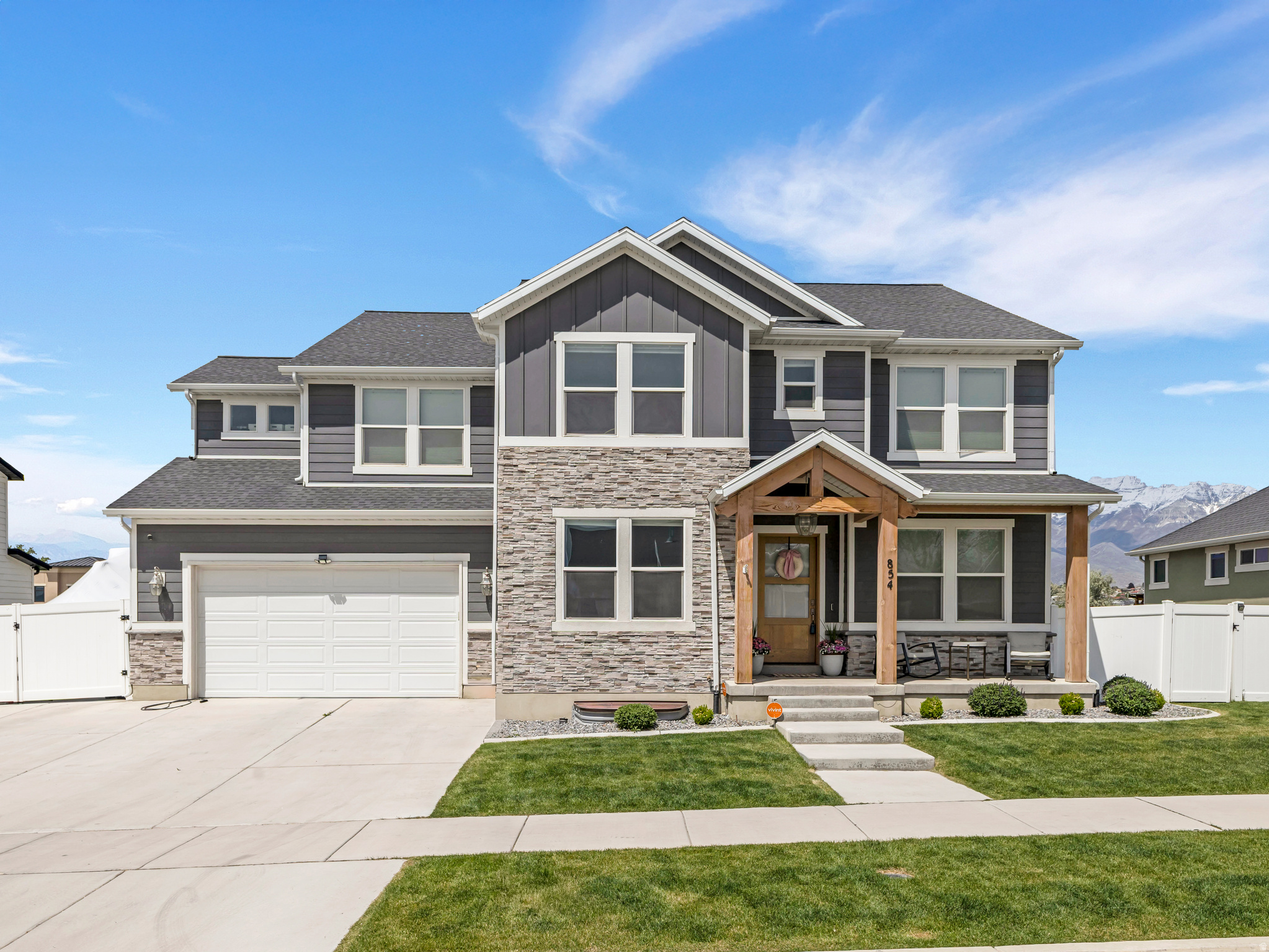 Better than new with a fully finished basement that includes a kitchinette and Sauna! The open-concept floor plan is ideal for entertaining, highlighted by a stunning 18' x 20' two-story great room with sweeping views of Mount Timpanogos. The elegant primary suite offers a vaulted ceiling and a spa-like bathroom complete with dual vanities, two sinks, a deep soaking tub, separate walk-in shower, and a spacious walk-in closet. Three additional bedrooms are conveniently located near the primary suite. The finished basement expands your living space with two more bedrooms, a kitchenette, a large family room, and a relaxing sauna-perfect for guests or extra living space. Built-in cabinetry in the family room and office adds both functionality and style. The garage measures approximately 22' wide by 23' deep, is wired for an EV charger, and the property also includes a full-length RV pad with an RV plug for added convenience. Square footage figures are provided as a courtesy estimate only and were obtained from County Records. Buyer is advised to obtain an independent measurement. Buyer to verify all.