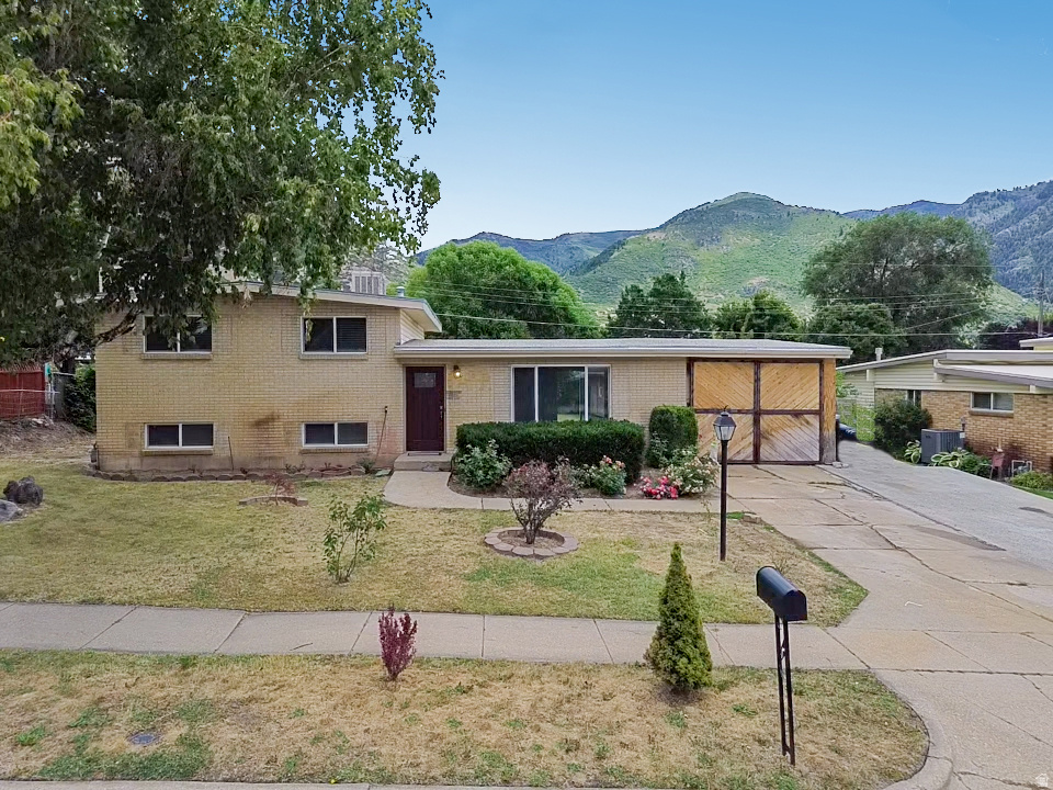 Welcome to North Ogden, where breathtaking mountain views and a spacious yard create the perfect setting for your next home! This 4-bedroom, 2-bath tri-level home offers a functional floor plan with plenty of room to live. With a little TLC and your personal touches, this home has incredible potential to become the perfect place for your family to enjoy for years to come.