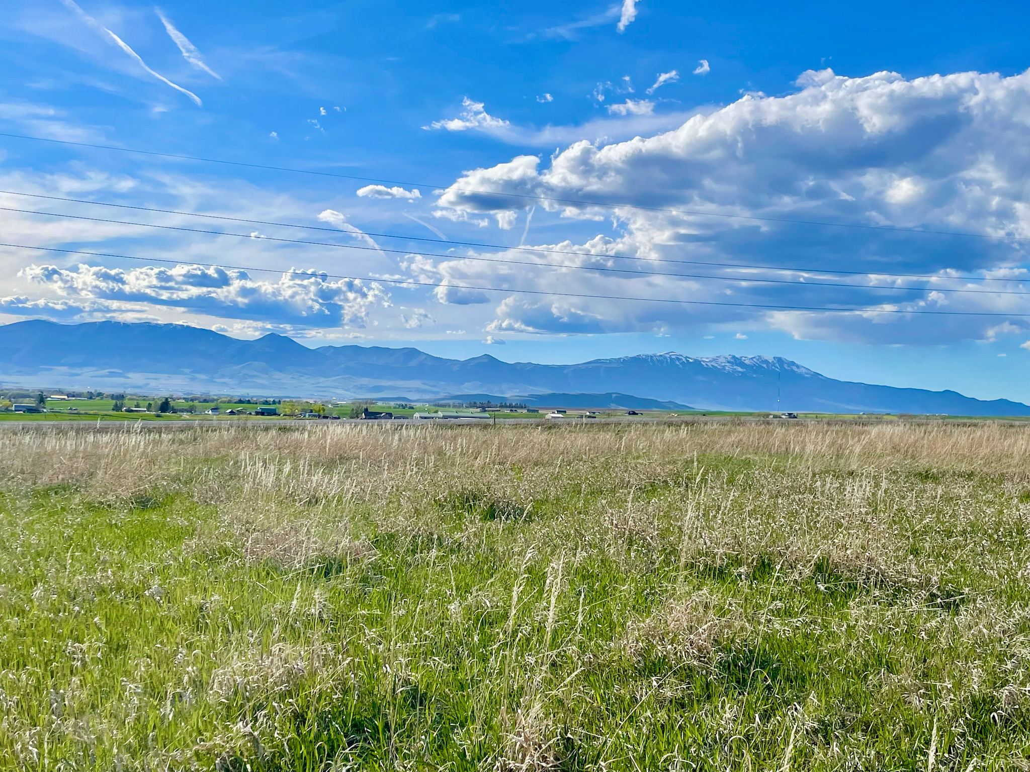 This property is 2.08 acres, and it has amazing views of the mountains and valley. The lot is very close to the lake so you can enjoy all the beauty and recreational opportunities that Lamont Reservoir has to offer. The property is near the mountains, water, and it's only a few minutes outside of the town of Preston. This lot has had power stubbed and has passed a PERC test for septic. Buyers will need to drill a well.  Lot 2 is not waterfront, but additional lakefront land is available. 2200 E will be paved this summer. Owner/Agent.