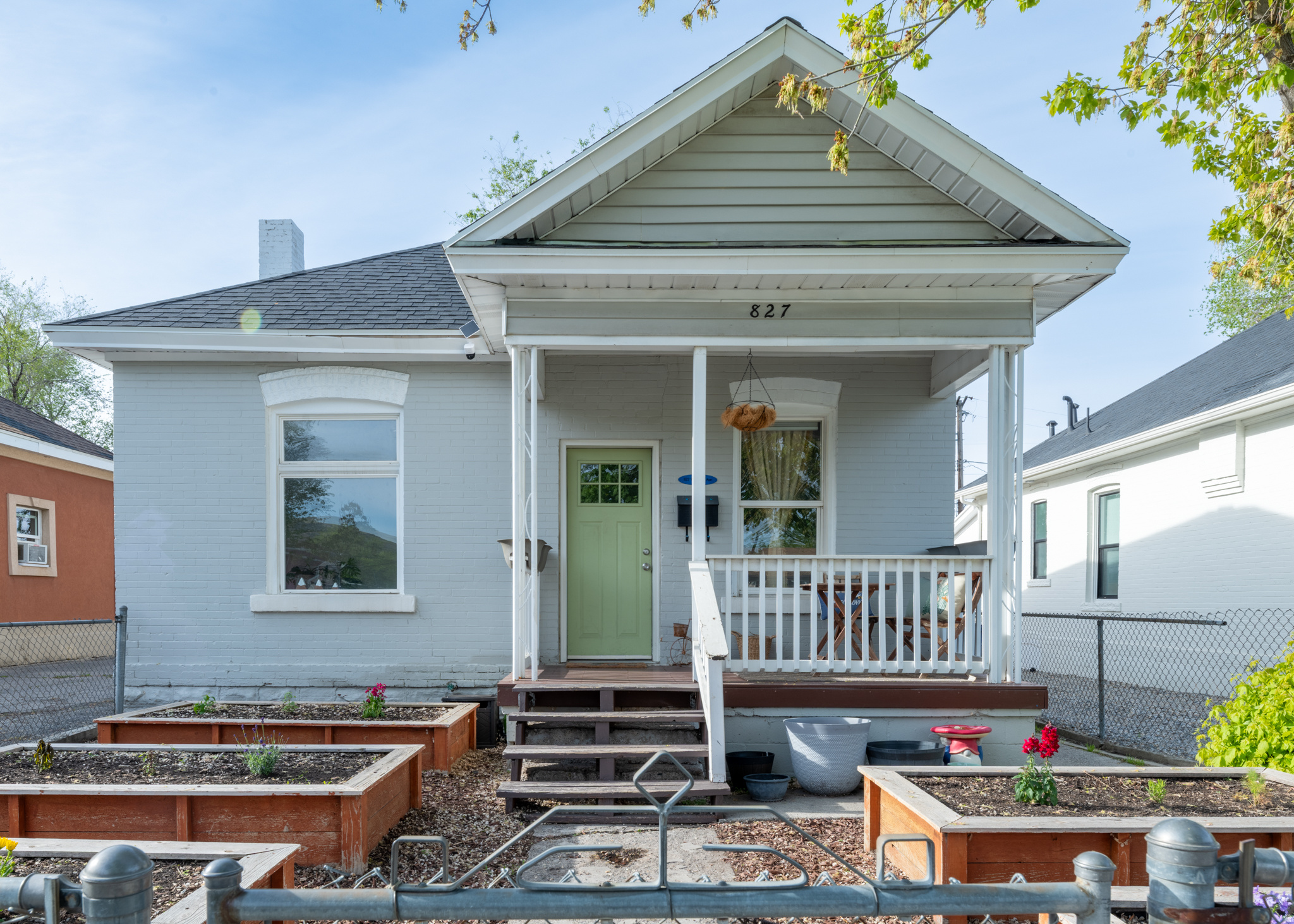 Welcome home to a beautiful 1907 bungalow. This home has been remodeled to incorporate all modern day amenities such as stainless steel appliances, while keeping the old world charm with arched walkways. The basement is fully finished with a large living room and storage areas. The backyard oasis is absolutely amazing including garden beds, seating area, fire pit, and a camper for retro charm. Don't forget the garden beds out front for flowers, herbs, or vegetables.  Fridge, washer & dryer unit included. The property has large mature trees, is .2 miles to Jackson Park, & only 1.5miles to downtown. Easily accessible to the 600 N I-15 entrance, a couple blocks away from UTA Green line, and a block away for bus routes or bike lanes. 8gbs Google Fiber internet available. Square footage figures are provided as a courtesy estimate only and were obtained from county records. Seller will contribute a home warranty & $3,000 seller paid concessions, can be used toward a rate buydown, closing costs, or a price reduction. Buyer is advised to obtain an independent measurement.