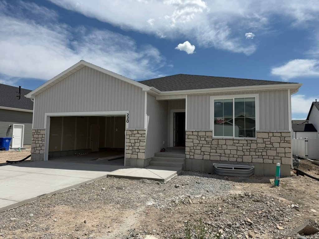 Come check out this NEW home in an amazing community in Smithfield!  9ft ceilings on the main floor.  Lots of windows for natural light.  Large unfinished basement for room to grow.  Fireplace, cabinets to the ceiling, pendant lights in kitchen, and ceiling fan in primary bedroom are just a few of the upgrades.  You are going to love the community and the included amenities like a community pool and hot tub, clubhouse, gym, dog park, pickleball courts, etc.  HOA is only $90/month and includes high speed fiber internet.  Two year warranty.  We only use premium soft close cabinets, premium high pylon carpet and flooring, and premium countertops.  Blinds included!  Blown in insulation everywhere and will have a fully insulated garage.  Home scheduled for completion in August 2026.  Hablo Espanol.