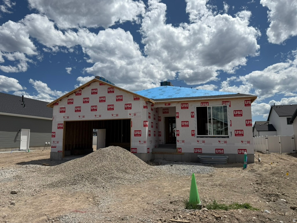 Come check out this NEW home in an amazing community in Smithfield!  9ft ceilings on the main floor.  Lots of windows for natural light.  Large unfinished basement for room to grow.  Fireplace, cabinets to the ceiling, pendant lights in kitchen, and ceiling fan in primary bedroom are just a few of the upgrades.  You are going to love the community and the included amenities like a community pool and hot tub, clubhouse, gym, dog park, pickleball courts, etc.  HOA is only $90/month and includes high speed fiber internet.  Two year warranty.  We only use premium soft close cabinets, premium high pylon carpet and flooring, and premium countertops.  Blinds included!  Blown in insulation everywhere and will have a fully insulated garage.  Home scheduled for completion in August 2026.  Hablo Espanol.