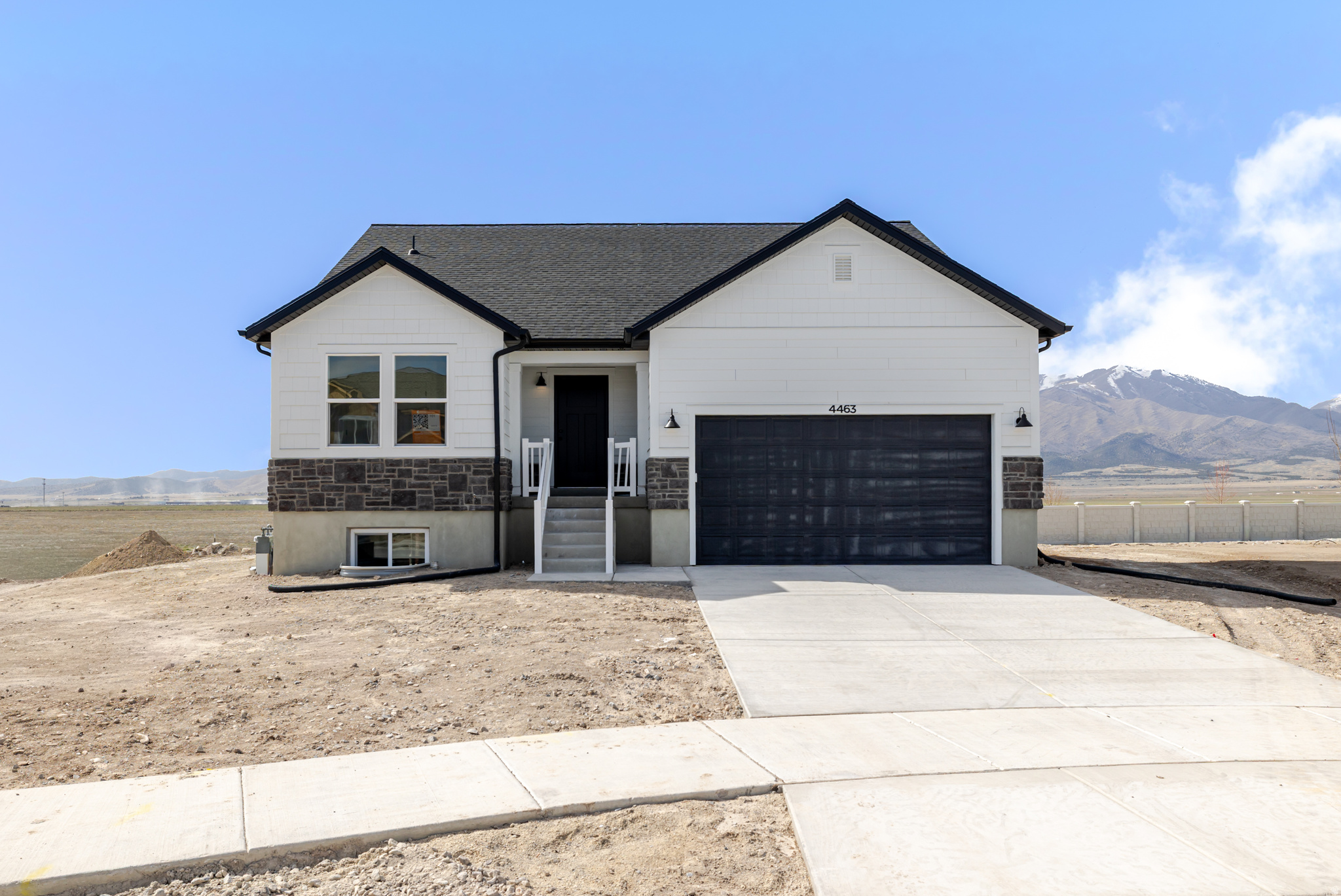 Welcome to Rose Ranch-an exciting new community in the heart of Eagle Mountain! These thoughtfully designed single-family homes shine with larger lots, giving you space for a three-car garage and plenty of outdoor living. Rose Ranch offers a vibrant, community-focused lifestyle with pickleball courts, the Eagle Mountain Ranch Bike Park, nearby schools, and easy access to local favorites like The Ranches Golf Club, Utah Lake, scenic parks, and trails. Surrounded by stunning mountain views, it's the perfect place to call home. Contact us today to start planning your future in Rose Ranch! (ETHAN LOT 101)