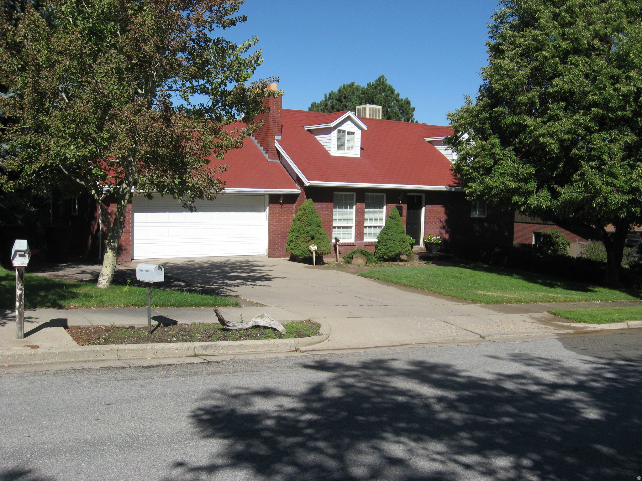 Don't miss this opportunity to own a great family home in the desired city of Bountiful! This two story home comes with two fireplaces, six bedrooms, two full and one three quarter bathrooms. In addition the basement has a large family room with a bonus room that could be used for an office or hobby room. Large laundry room has access to the patio. This home offers peaceful living with convenient access to everything you need.  Minutes away from access to the freeway, downtown Salt Lake, shopping, dining and more.  Fresh paint and new carpet throughout making it move in ready. There is a two car garage with a large RV pad catering to adventures and road trips alike.  Roof and swamp cooler are 3 years old.  This home is just waiting for a new family to love it!  Home is vacant making it easy to show. Square footage figures are provided as a courtesy estimate only and were obtained from county records. Buyer is advised to obtain an independent measurement.