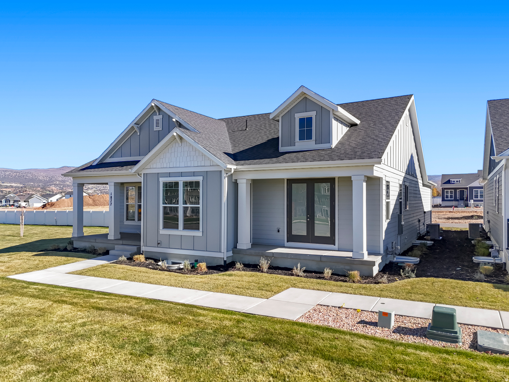 Sales Event! Receive $58,800 towards interest rate buy down and or closing costs with preferred lender. Main floor living at its best. 9' ceilings on the main. Large extended 3rd car garage with extra height and depth. Enjoy the mountain views with 3 outdoor patio areas. The primary suite is a retreat with spa like bathroom and access from the primary closet into the laundry room. Office on the main with glass french doors, quartz countertops throughout, HUGE walk in pantry, double ovens, gas cooktop, 9' ceilings in the fully finished basement offering a spacious family room, large windows with abundant natural light, and storage galore!  This home sits on a very private lot.  No neighbors to the North, Just a massive lawn that is maintained by the HOA.  This home includes full landscaping.  Buyer to verify all.