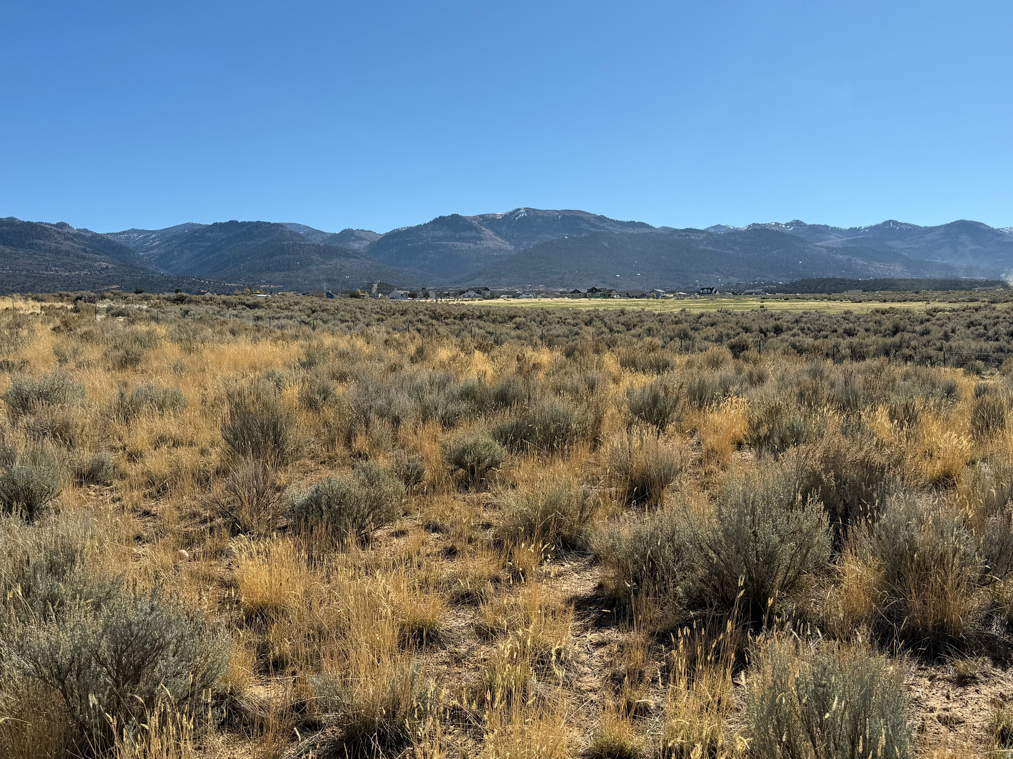 Located just outside of Mount Pleasant, this beautiful 5-acre parcel sits at the base of the stunning Skyline Drive mountain range, offering peaceful surroundings and incredible panoramic views. Enjoy the balance of seclusion and convenience just 1.5 hours from Salt Lake City, 45 minutes from Interstate 15, and only 10 minutes from Skyline Mountain Resort & Golf Course. A great spot to build, relax and take in the best of Utah's mountain living. Power is located near the front of the lot and the property includes access to a shared well.