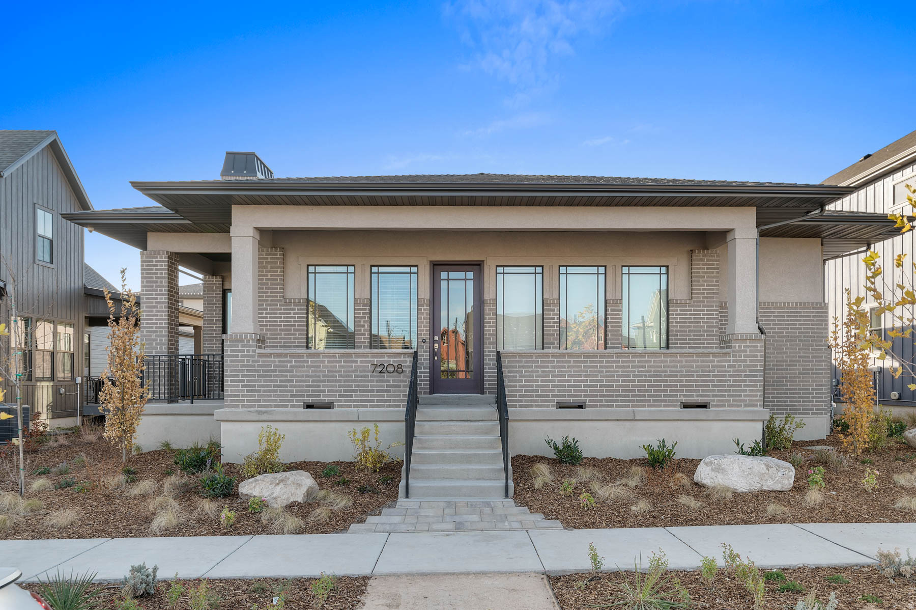 Beautiful brand new Hollyhock Prairie model home in a great up and coming community! This home features a stylish kitchen with cotton maple cabinets, quartz countertops, tile backsplash and stainless steel gas appliances with double ovens. Elegant finishes include laminate hardwood, tile, and carpet flooring for a durable finish. Modern comforts abound with a tankless water heater, energy-efficient options, christmas light outlets and a gas log fireplace. Enjoy thoughtful design touches such as a wood railing at the stairway, theatre room and covered patio. The grand bathroom features a Euro glass shower enclosure and cultured marble surrounds. Finished with two-tone paint, large craftsman base and casing, and satin and brushed nickel hardware, this home blends warmth, function, and timeless appeal.