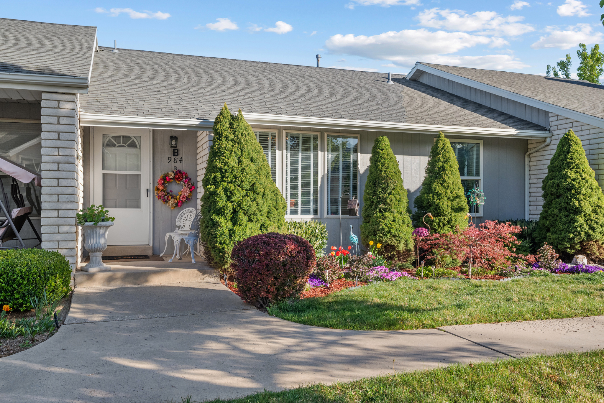 Beautifully remodeled rambler townhome in American Fork.  Open floor plan with vaulted ceilings and lots of natural light.  The remodeled kitchen has a large kitchen island, new white shaker cabinets, quartz countertops and new appliances.  Large barn doors cover the pantry and washer & dryer.  Main floor has kitchen, dining, laundry, Living Room, 2 bedrooms and a full bath that is accessible from the primary bedroom.  Basement has a large family room, a bathroom, another bedroom and a large storage room.  Basement has polished stained concrete floors.  The private back patio is great for enjoying the outdoors on warm sunny days.   Great location close to Costco, Target, shopping, dining, movie theaters and quick access to I-15 freeway.   All information is provided as a courtesy.  Buyer or buyer's agent to verify all info.