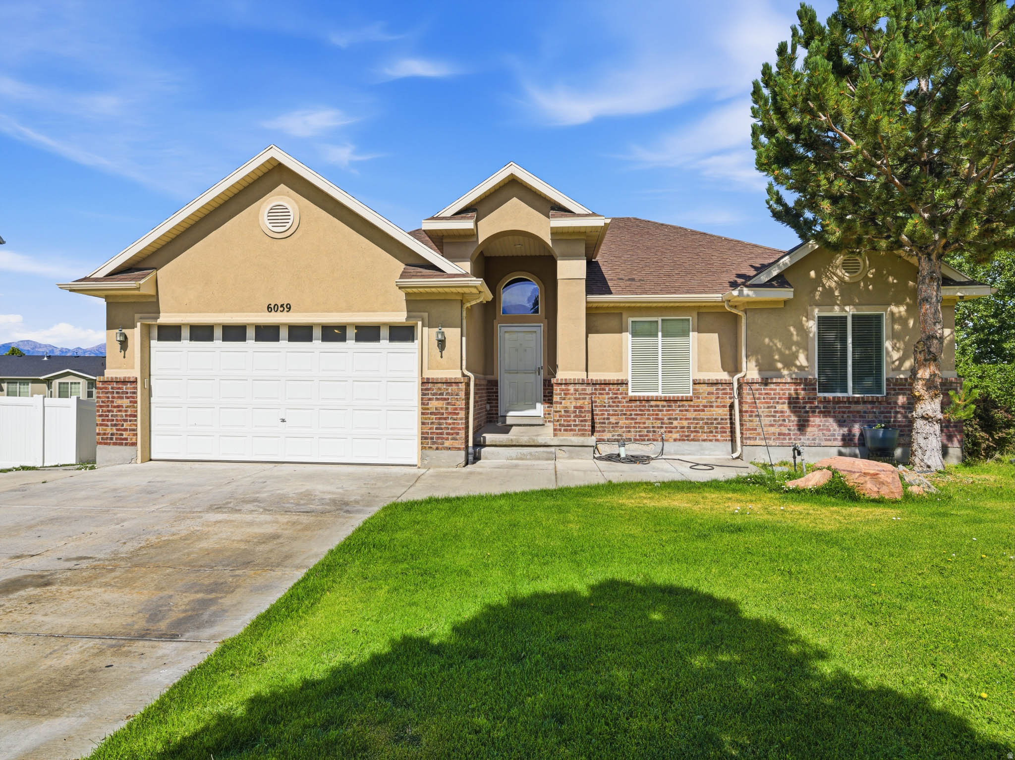 Welcome to this beautiful 6-bedroom, 4-bath home located in the desirable Stansbury Park community! This spacious property offers an ideal blend of comfort, space, and location with a walk-out basement! The home features newly installed carpet, a functional layout with plenty of room to spread out! Located only 35 minutes from Salt Lake City, this home offers the perfect balance of peaceful neighborhood living while still being conveniently close to shopping, dining, and city access.