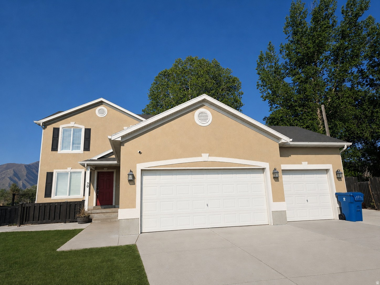 Highly desirable home located on the 15th hole of the Stansbury Park Golf Course with unobstructed eastern mountain views and an ideal east-facing backyard perfect for summer entertaining. Rare 3-car garage plus oversized RV parking provides plenty of space for trailers, boats, and toys. The main floor features a versatile bedroom/office/flex space, while the oversized primary suite includes a private sitting area. Recent upgrades include updated bathrooms, a new furnace, water heater, and brand-new roof. The finished basement offers 2 additional bedrooms plus space for a future kitchenette, ideal for multi-generational living or guests. Stansbury Park is a very active, outdoorsy community featuring a lake, golf course, pool, kayaking, and paddleboarding. Only 27 minutes to Salt Lake Airport and 33 minutes to downtown Salt Lake. Easy to SHOW!   If interested in the 1-0 buy down I can point you in the direction of Lenders that have it available. No need to use my preferred lender to get it!  Square footage figures are provided as a courtesy estimate only and were obtained from county records. Buyer is advised to obtain an independent measurement.
