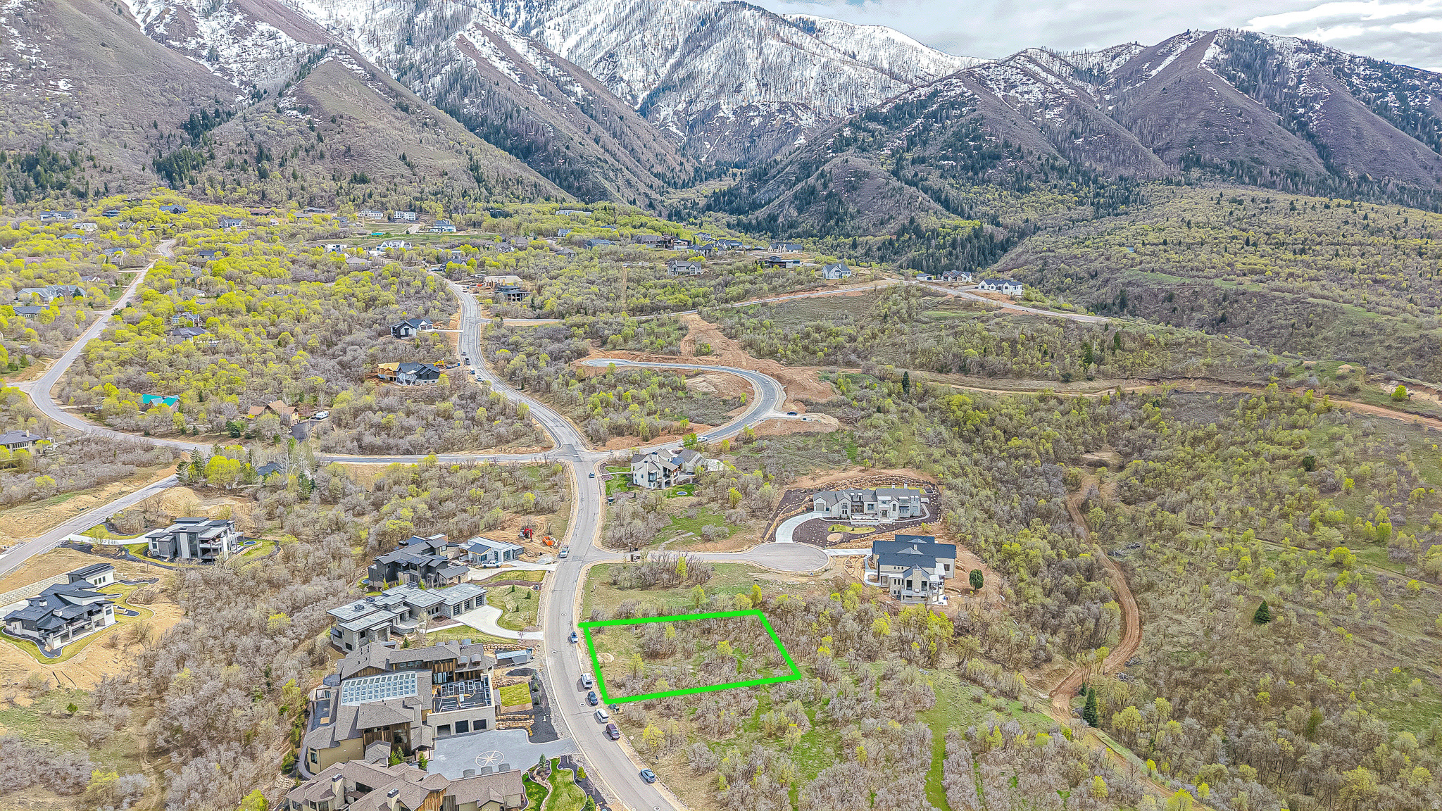 SELLER FINANCING AVAILABLE!!! Mountain Luxury lot with breathtaking views in an exclusive community! Perched high in the heart of Summit Creek in Woodland Hills, this exceptional building lot offers panoramic views that stretch for miles-towering peaks, rolling ridge lines and vibrant sunsets all from your future porch. Set within an exclusive gated neighborhood known for its privacy and prestige, this lot combines natural beauty with enticing amenities. Enjoy access to a range of features including a private clubhouse, fitness center, hiking trails, pools, hot tub and future pickleball and tennis courts. Each lot is situated so that each home feels like it's tucked in the woods. With thoughtfully designed infrastructure already in place-paved roads, underground utilities and high-speed internet-this lot is ready for your custom dream home. With no immediate back yard neighbors, this walk-out basement lot is perfection waiting to happen! Wether you are envisioning a mountain modern retreat or something more traditional, the setting is unmatched. Tranquility, luxury and adventure await-don't miss the opportunity to build your legacy in one of the most sought after mountain communities in Utah county! Building plans  and home builder available.