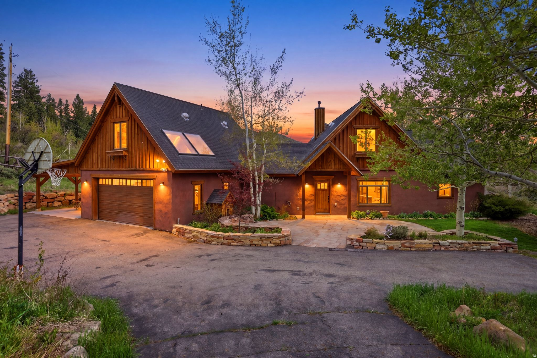 Set on approximately 1.84 acres in a private, sun-drenched setting, this beautiful 5-bedroom, 3-bathroom home offers the perfect balance of space, functionality, and lifestyle. Built with Insulated Concrete Forms (ICF), the home is exceptionally energy-efficient, providing superior insulation, durability, and year-round comfort. Paired with a solar system featuring net metering, this property delivers meaningful energy savings and a more sustainable way of living. The flat, usable land is a rare find, complemented by mature landscaping that creates a peaceful and inviting environment year-round. Designed for both everyday living and entertaining, the home features exceptional indoor and outdoor spaces, including multiple patios that seamlessly extend your living areas into the surrounding landscape. Whether hosting gatherings or enjoying quiet mornings, this property offers a setting that feels both open and intimate. A standout feature is the included ADU with a separate entrance, ideal for guests or multigenerational living. The property also includes a charming greenhouse and garden area, perfect for those who appreciate sustainable living or simply enjoy time outdoors. Additional highlights include a separate storage shed, an oversized two-car garage, and an additional covered carport, providing ample space for vehicles, tools, and recreational gear. All of this is conveniently located with easy access to both Park City and Salt Lake City, offering the best of mountain living with close proximity to world-class recreation, dining, and amenities.