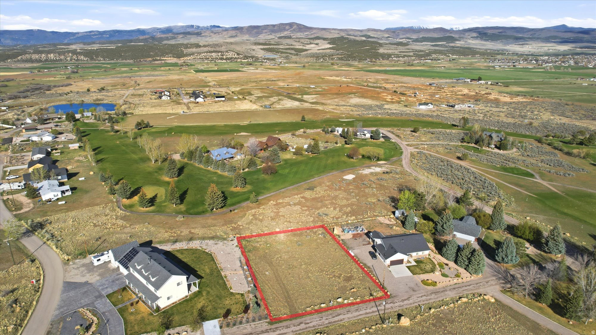 Perfectly positioned on a .54-acre Skyline Mountain Golf Course lot, this homesite offers the best of golf-course living - panoramic views without the worry of stray golf balls. Oriented perpendicular to the #2 tee, the lot enjoys unobstructed east- and west-facing views across three separate holes, all while keeping your yard and windows safely out of play. Located in one of the coveted "A" lots, this property sits on a peninsula extending into the golf course, creating a rare sense of openness, privacy, and visual depth. Year-round access and a build-ready setting make it easy to bring your vision to life. Water and electricity are already stubbed to the lot; septic and propane will be required. As part of the HOA, you'll enjoy access to Skyline Mountain Golf Course, along with a swimming pool, tennis and pickleball courts, playground, and additional recreational amenities - perfect for both full-time living and a mountain getaway. Imagine living next to the golf course - waking to morning light moving across the fairways, stepping outside to a sweep of green that's always beautifully maintained, and feeling the quiet calm that comes from open space and thoughtful design. Walk the lot, take a deep breath, and see how naturally this setting invites you to slow down and stay awhile.