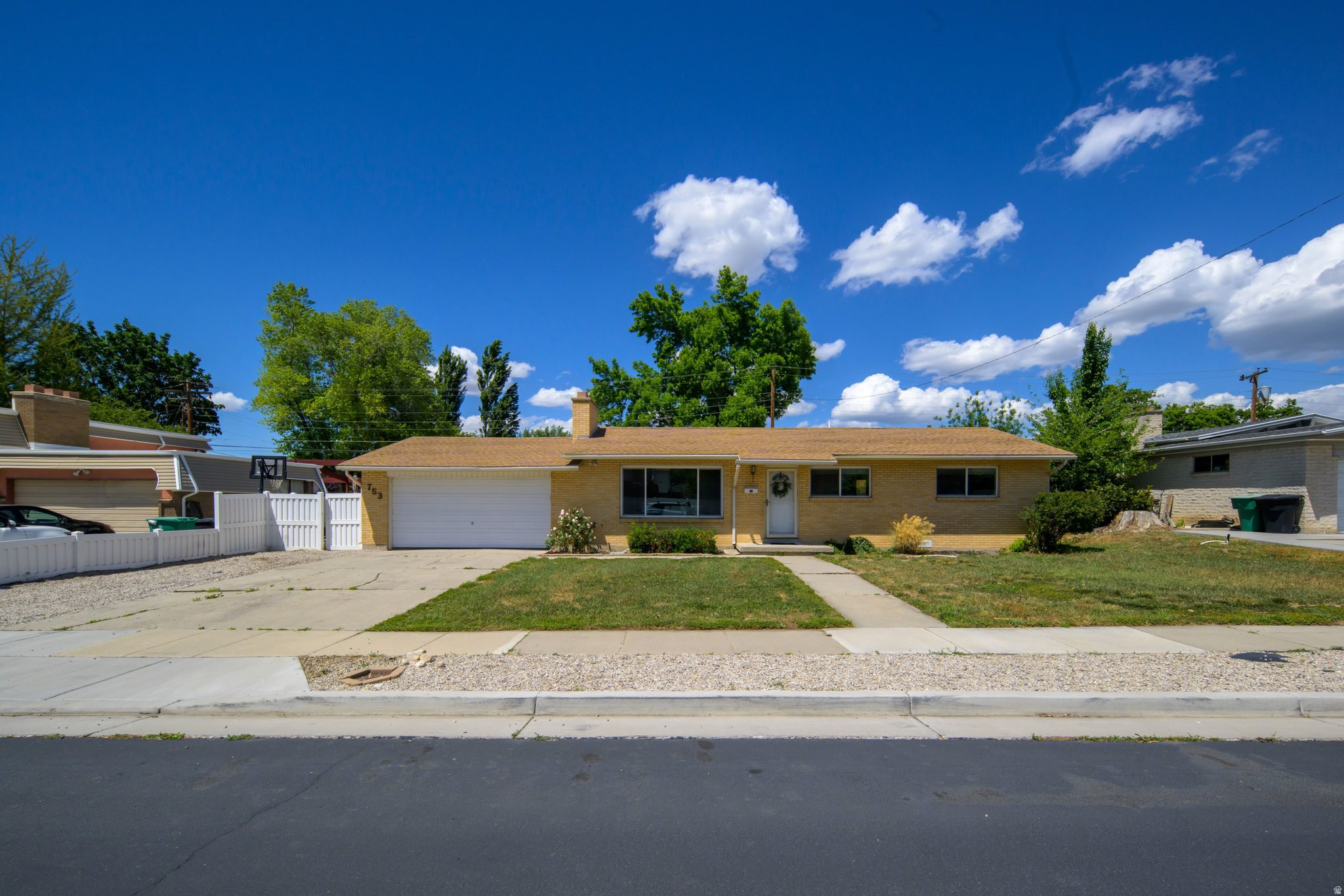 Charming home with incredible potential! Single-level living in the heart of Murray, on a quiet tree lined street!  Featuring brand new LVP flooring, paint, carpet, granite countertops, fireplace and functional floor plan!  Bring your ideas and unlock the possibilities!  Step outside to a large fenced yard with endless options,  perfect for entertaining, kids, pets, gardening, or create your own backyard retreat, all while offering the opportunity to add your personal touch and make this home truly your own!