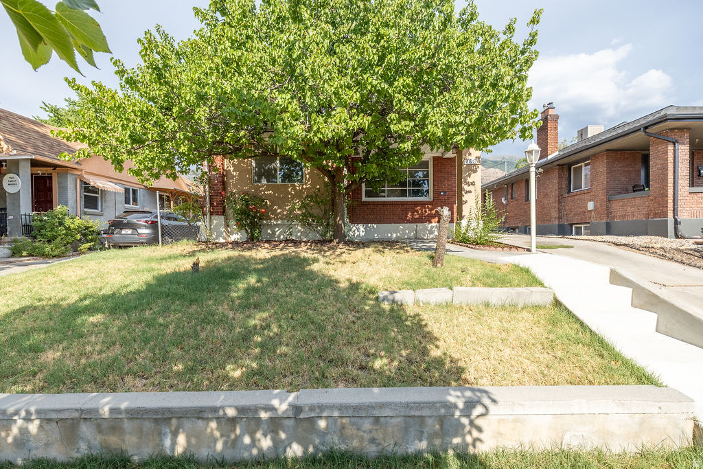 Charming 3-bedroom, 2-bath bungalow with timeless brick construction, a private driveway, and a 1-car garage. This beautifully updated home features new plumbing, electrical, flooring, and paint throughout, offering the peace of mind of modern upgrades while preserving its classic character. The spacious open-concept living area creates a bright, inviting space for everyday living and entertaining. Enjoy the mostly fenced backyard, perfect for relaxing, pets, or outdoor gatherings. Move-in ready and in excellent condition! Max Fletcher - Equity Real Estate - Bear River, 435-799-1902