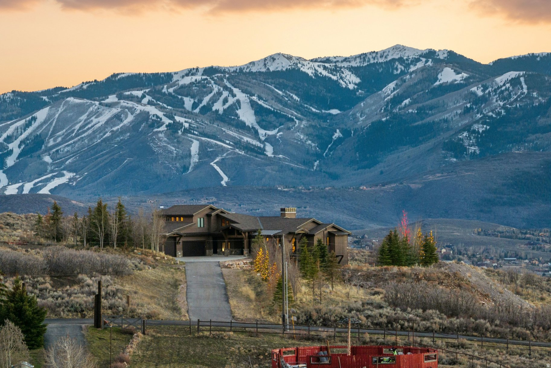 Just outside the bustle of town, where the sky stretches wider and the mountain air feels a little quieter, sits a home that offers more than a property-it offers a way of life. Welcome to Silver Creek Estates, just outside Park City.  Situated on nearly ten acres, this thoughtfully positioned home captures unobstructed 180-degree views of Park City's sweeping mountain landscape. Here, the mountains become part of daily life-something you live within, not simply visit.  Inside, expansive yet inviting interiors are designed for effortless main-level living across three seamless levels. With 5 bedrooms, 6 baths, two of which are primary suites, the home easily accommodates both quiet retreats and lively gatherings. A private theater, game room, and spacious family room create perfect spaces for relaxing and entertaining.  Step outside and the landscape becomes your playground. Multiple trail systems extend just beyond the property, offering miles for hiking, biking, and peaceful walks. For equestrian enthusiasts, the nearly ten-acre setting provides the rare opportunity to keep horses at home while enjoying access to nearby trails.  In winter, play in the snow on snowshoes or cross-country skis, or add some power with snowmobiles.  All of this sits just minutes from historic downtown Park City-home to world-class skiing, acclaimed dining, vibrant nightlife, and year-round events-while a major international airport is only about 30 minutes away.  At Silver Creek Estates, you don't just visit the mountains. You live them.