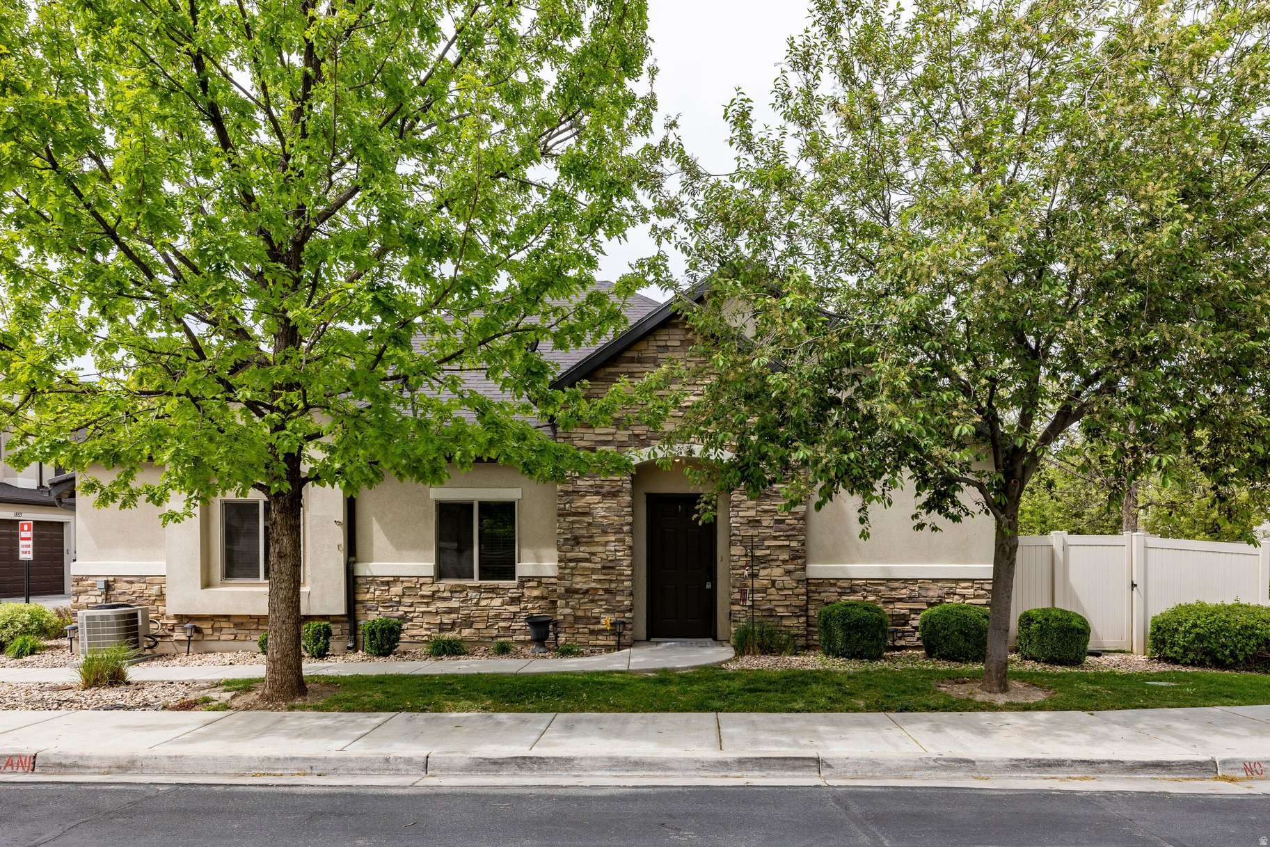 Rare single-level townhome in desirable Valentine Estates, Woods Cross! No-step entry makes this home a true find. Featuring 2 bedrooms, 2 bathrooms, plus an office that easily serves as a 3rd bedroom, attached 2-car garage, and private fenced yard. Freshly painted and move-in ready with all appliances included, fridge, washer, and dryer. The community is peaceful and quiet and amenities include a pool, playgrounds, and direct access to the Legacy Trail for biking, running, and outdoor recreation. Close to top-rated schools with language immersion programs, plus a quick commute to SLC International Airport and downtown Salt Lake City. Perfect for retirees, downsizers, or first-time buyers. Don't miss this rare opportunity, schedule your showing today!