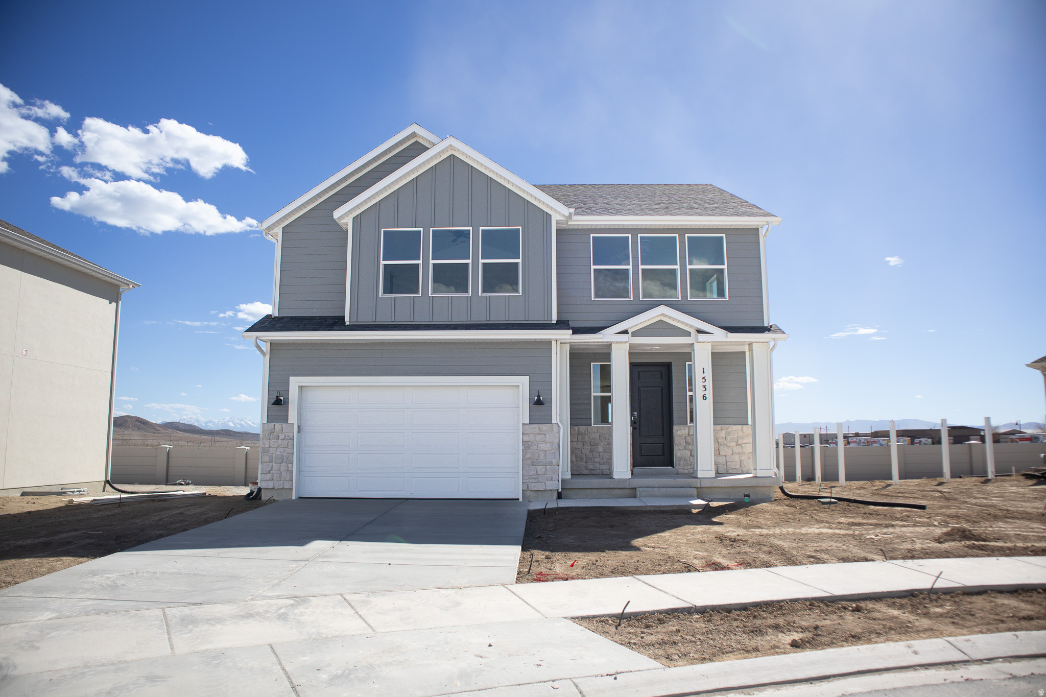 AMAZING $20,000 INCENTIVE TOWARDS CLOSING COSTS, RATE BUYDOWN, OR PRICE REDUCTION REGARDLESS OF LENDER! (Talk to agent for conditions). Must-see Parkway Fields Community in Eagle Mountain! Move-in ready! This beautiful home built by Flagship Homes features 4 bedrooms, 2.5 bathrooms, quartz slab countertops, painted cabinets, laminate flooring on the main level, a large loft on the 2nd floor, landscaped front yard, 2 car garage, decorative concrete wall on rear boundary and backyard (can be landscaped for an additional charge). The primary bedroom has a vaulted ceiling, large walk-in closet, and dual sinks with a separate tub and a double shower. With an unfinished basement, this home provides space for storage and room to grow. (If preferred, basement can be finished for an additional charge.) Call for more information or stop by our model home at 1546 E. Starling Lane, Eagle Mountain for a tour. Model home hours: Monday-Saturday 11 AM - 6 PM. Buyers to verify all information. Square footage is from house plans. Show Inst: Call Agent/Appt