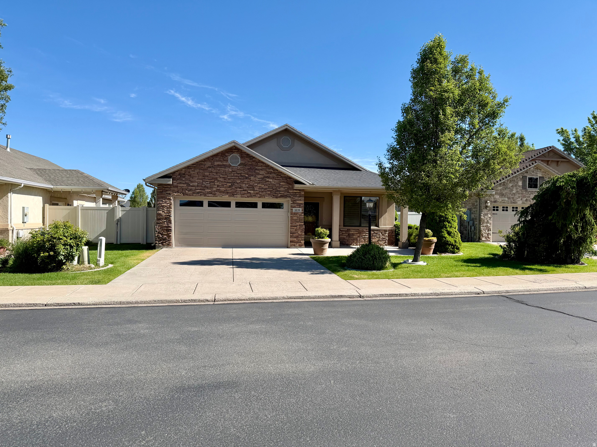 New to Market in Nibley- 55+ Community, Convenient and Quiet Location, Open and Inviting floor plan with large gathering room, flex room plus 2 bedrooms and 2 full bathrooms, covered patio, vaulted ceilings, fireplace and $6,000.00 flooring allowance, or price reduction. Low HOA Fees- Buyers To Verify HOA  Added Storage above garage