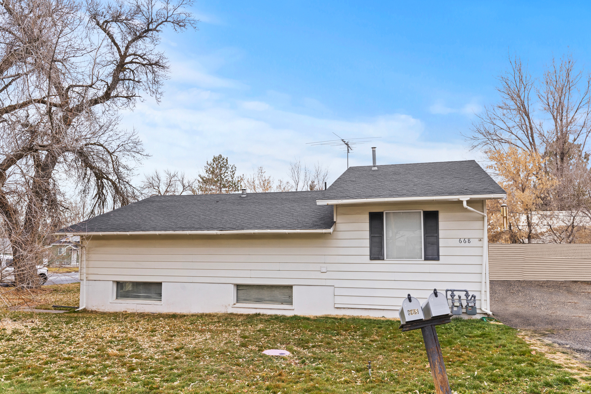 Don't let this one slip away! This corner lot duplex sits on almost 1/4 acre with plenty of parking. Multiple upgrades throughout. Fantastic investment opportunity. Unit #2 is a studio style unit. Schedule your showing today!