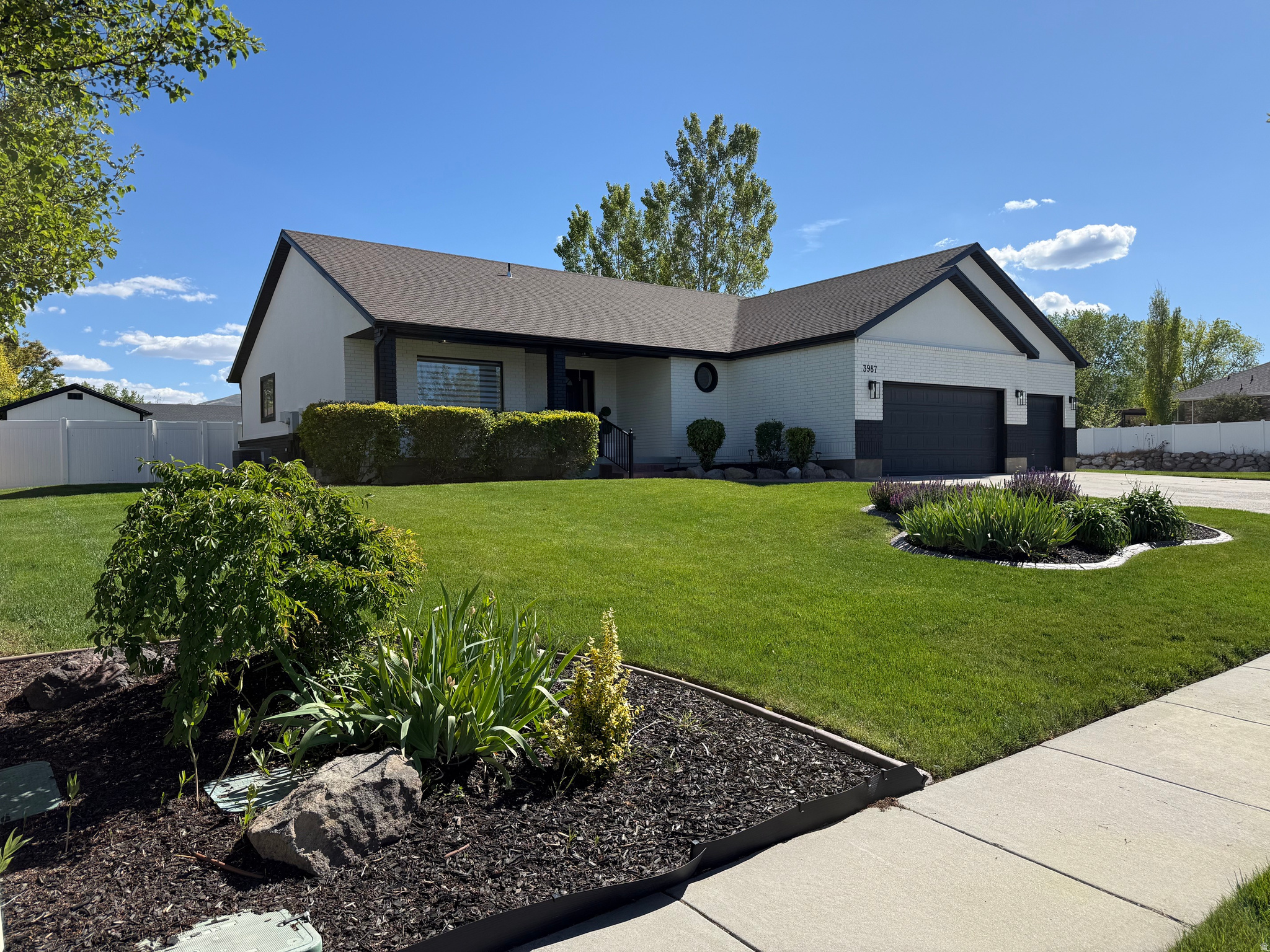 Beautifully updated home in desirable Deer Mountain Estates. No HOA! Home sit's on .54 acre with 2 large concrete patio's. One with a hot tub below a covered pergola, and the second with a large basketball play area. This fully fenced yard offers many options, possible detached garage, swimming pool or both. RV parking. Large storage shed included.  Basement has an additional entrance from inside the oversized 3 car garage, epoxy flooring. Possible ADU with an approved application from Riverton City. Basement offers 2 bedrooms, full bathroom, kitchen, family room, 2 oversized pantries, an exercise room, laundry room, and an oversized cold storage room. Updated roof, furnace, a/c, water heater approximately 2021. Updated flooring, lighting. Electric built in fireplace in master. Great curb appeal. This home is minutes from Herriman village, shopping, restaurants, freeway access, etc.