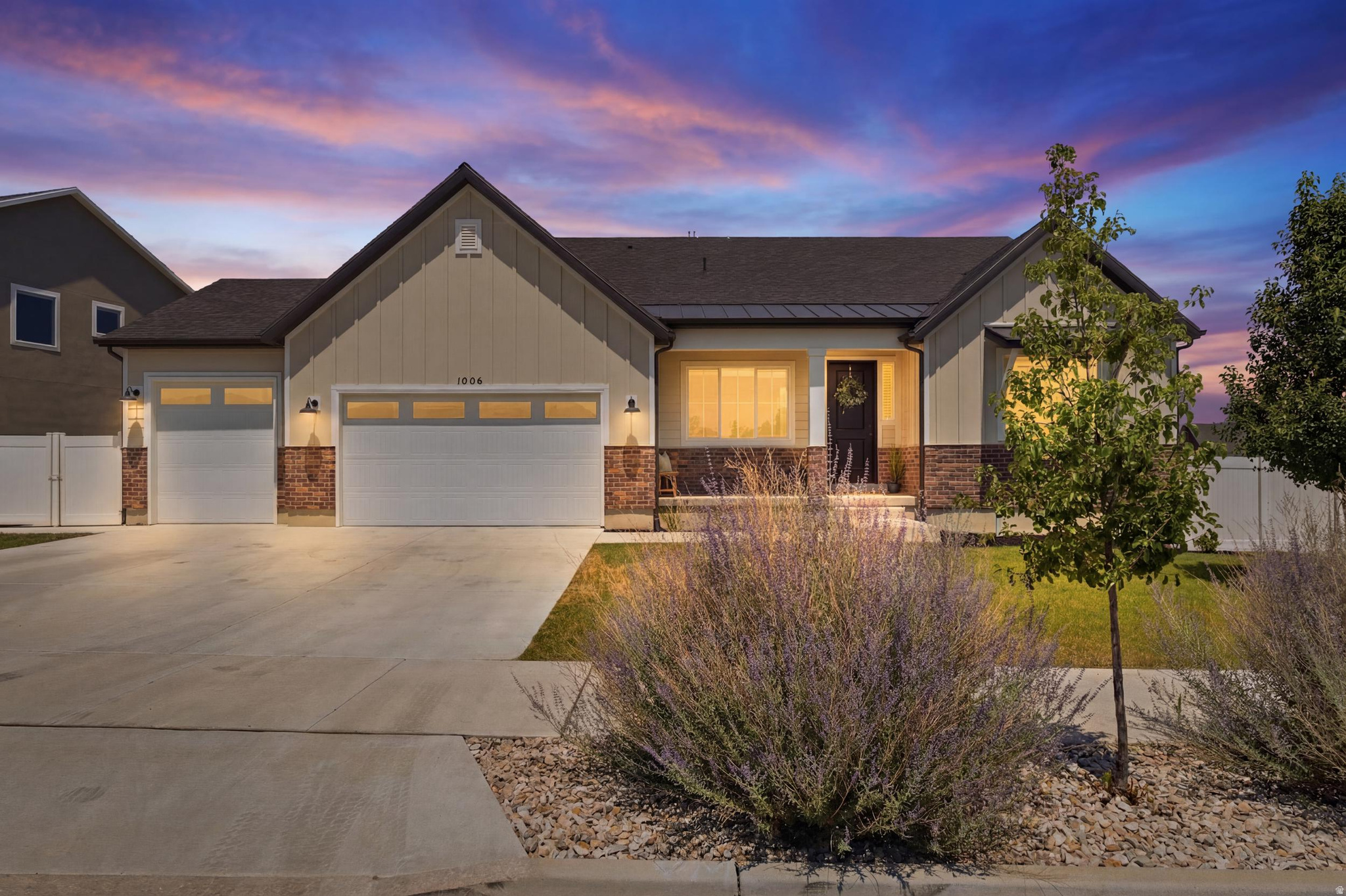Nestled in one of South Jordan's most sought-after neighborhoods with no HOA, just minutes from the freeway and surrounded by luxury custom homes -- in fact there are 3 homes within walking distance in this year's 2026 Salt Lake Parade of Homes -- feels-like-a-brand-new rambler, with elevated finishes, offers the perfect blend of elegance, functionality, and convenience. The home features a dedicated office off the main entry, a spacious vaulted great room, an oversized quartz island, five generously sized bedrooms, a 2nd kitchen in the fully finished basement with an extra large family room. There is space to add a separate basement entrance, ideal for multi-generational living, extended guests, or future income opportunities. Step outside to enjoy the covered patio and an fully fenced and finished backyard.  Additional highlights include an extra-height, extra-long 3-car garage with ample space for vehicles, toys, and storage. Located just steps from the Jordan River Trail, you'll enjoy miles of scenic walking and biking paths right outside your door, while shopping, dining, and everyday conveniences remain just minutes away.