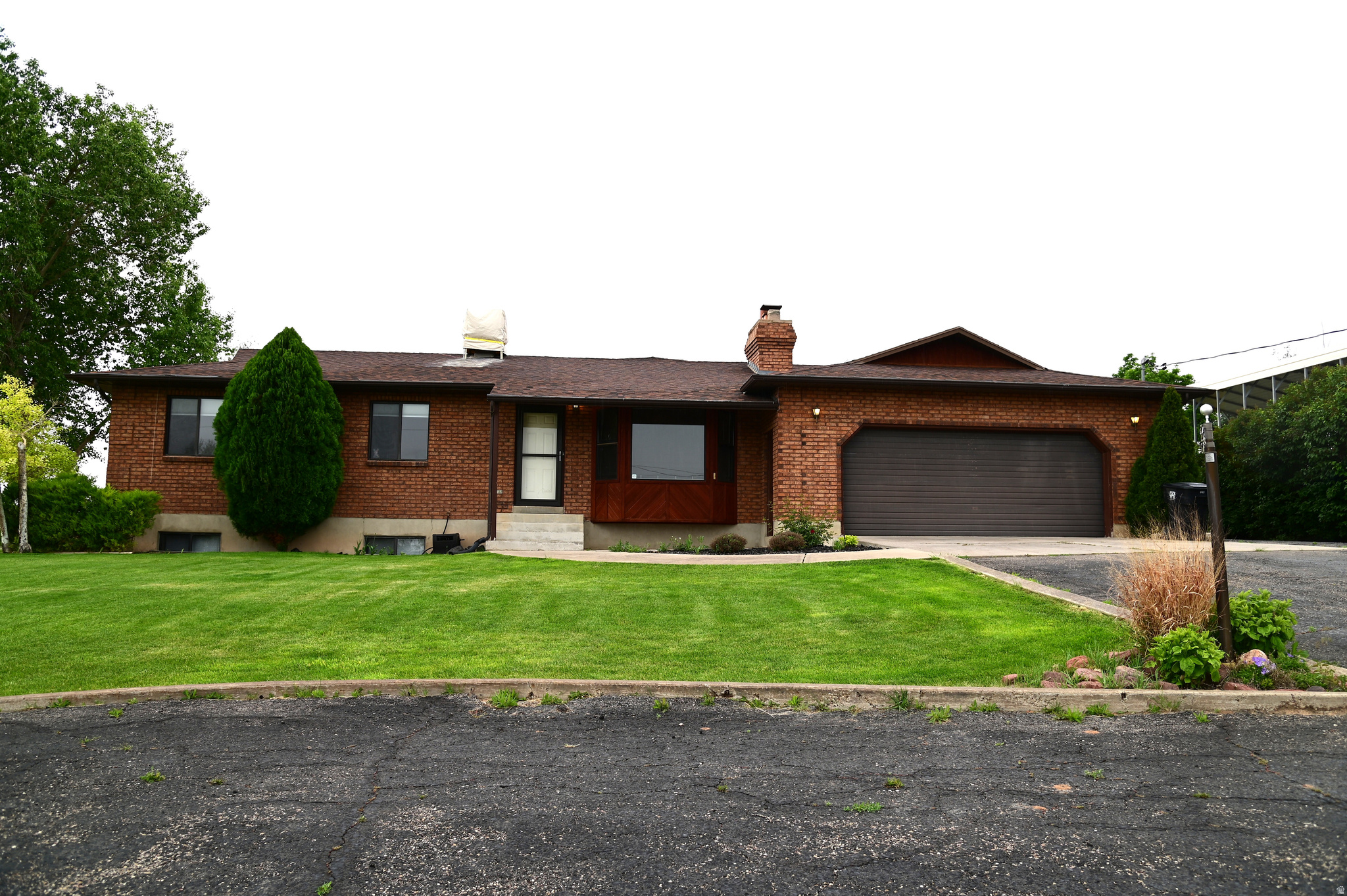 Enjoy stunning views and peaceful country living in a quiet, safe neighborhood. This property offers plenty of space for animals and gardening, plus two sheds, a barn, and a chicken coop. Inside, you'll find a beautiful fireplace and bedrooms with brand-new carpet, making this home both comfortable and inviting.