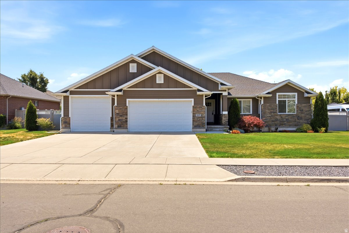 Beautiful Craftsman Rambler with Room to Grow! This beautiful home offers over 3,400 sq. ft. with 3 bedrooms, 2 bathrooms, an open floor plan, granite countertops, hardwood floors, and a cozy fireplace. The spacious primary suite includes a walk-in closet, jetted tub, and separate shower. You'll love the fully landscaped yard, covered patio, mountain views, and oversized tandem garage with plenty of room for vehicles, toys, and storage. The walkout basement with a separate entrance gives you endless possibilities. With a little work, it could become an ADU (buyer to verify city requirements), making it a great option for rental income, guests, or family. This home has the space, location, and potential you've been looking for! This is a trustee sale; the seller has never lived in the home. There will be NO SELLERS' DISCLOSURE provided