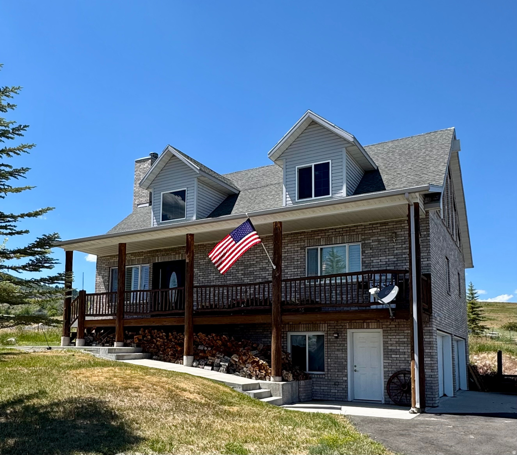 Rare property located outside of an HOA!! Enjoy spectacular Bear Lake and mountain views from this low-maintenance brick home featuring tongue and groove pine throughout.  Short-term rentals are allowed, making this an excellent investment, vacation retreat, or full-time residence. Direct access to forest trails provides endless year-round recreation, including hundreds of miles of groomed snowmobile and ATV trails, with Beaver Mountain Ski Resort just 15 minutes away. The property is completely fenced allowing for animals and perfectly positioned to enjoy all that Bear Lake has to offer. All furniture in the home is included. Don't miss out on this home!!