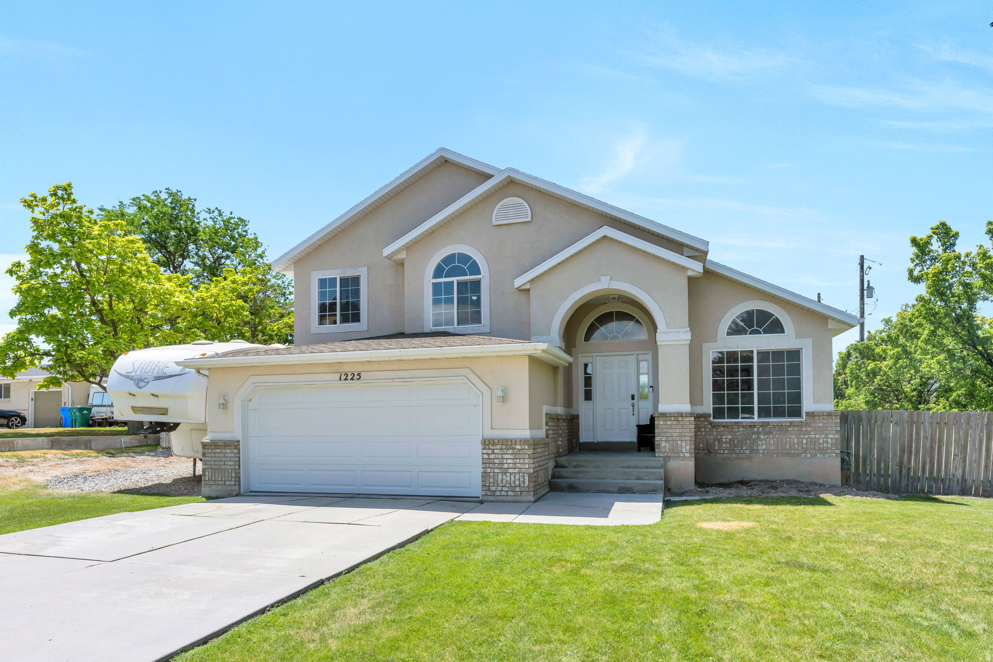 Beautiful 2-story home on a .31-acre corner lot in a highly sought-after Riverton neighborhood! The updated kitchen features white cabinetry and opens to a spacious family room. Primary bathroom includes a brand-new shower and flooring. Offers 5 bedrooms total, with 2 in the finished basement. Great back yard with a koi pond, wood bridge, mature trees, and flat lawn. Includes gravel-set RV parking. Minutes to I-15 and shopping!   Square footage figures are provided as courtesy estimates only and were obtained from county records. Buyer is advised to obtain an independent measurement.