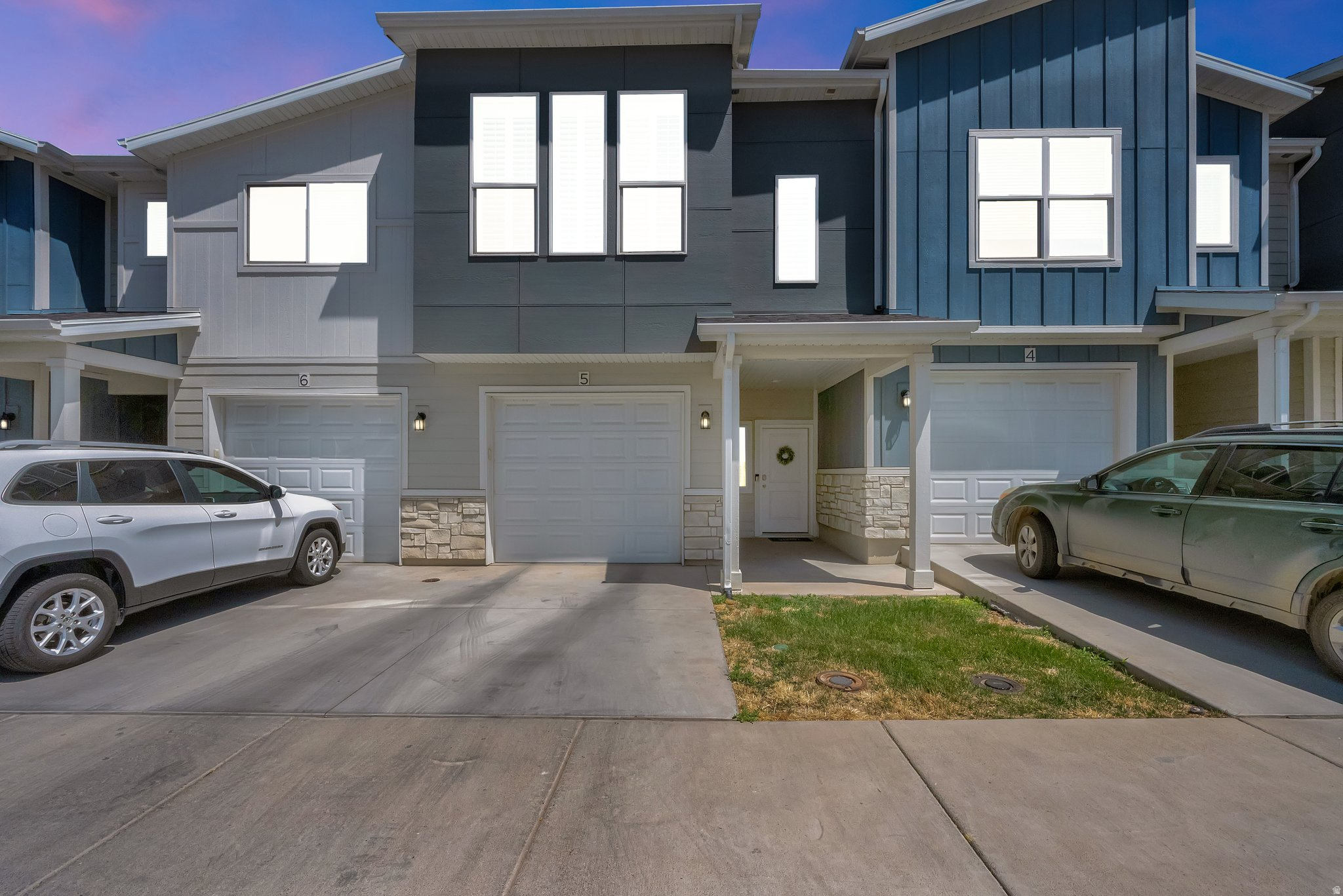 Welcome to this beautifully maintained townhome in the heart of North Ogden. Built in 2019, this 3-bedroom, 2.5-bath home offers stunning mountain views and a bright, open-concept floor plan designed for comfortable living and effortless entertaining. Elegant plantation shutters throughout the home enhance its charm while helping improve energy efficiency year-round. One of the unique features of this home is the convenient access to the backyard green space, providing additional room to relax, play, entertain, and enjoy the outdoors. Located in a highly desirable, well-maintained community known for its incredible neighborhood atmosphere, this home is just minutes from schools, shopping, hiking trails, and the North Shore Aquatic Center. Residents enjoy access to exceptional amenities including a clubhouse, fitness center, basketball courts, and pickleball courts. For added convenience, the refrigerator, washer, dryer, and dishwasher are all included with the sale, making this home truly move-in ready. Don't miss this opportunity to own a nearly new home in one of North Ogden's most sought-after locations. Schedule your private showing today. Buyer and buyer's agent to verify all information. Information provided as a courtesy only.