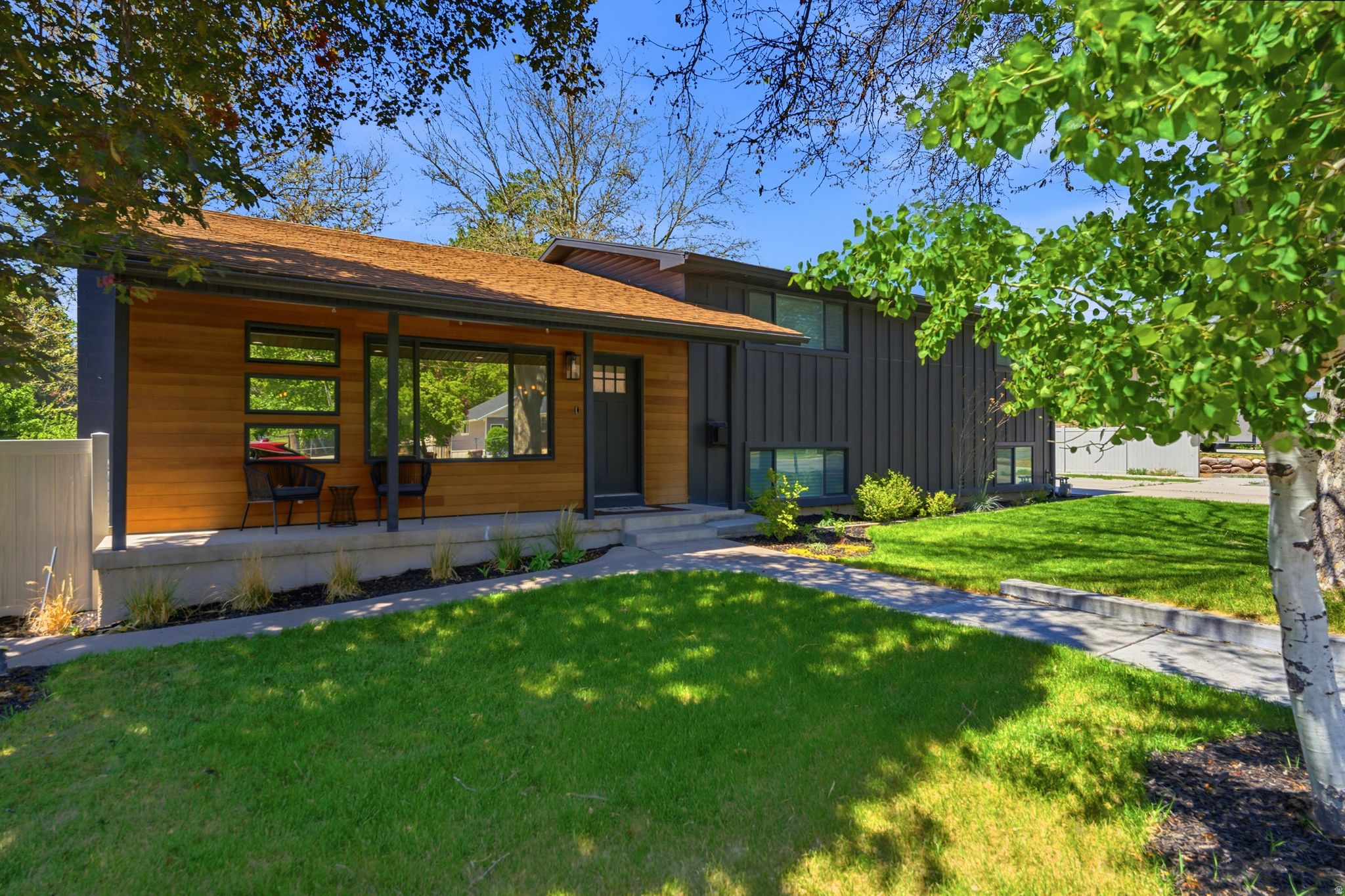 Completely reimagined Alpine home on a spacious 0.54-acre lot, offering rare flexibility at this price point. Since 2018, the home has undergone a major transformation, including a striking remodel, redesigned kitchen, updated flooring, remodeled bathrooms, and open-concept living spaces filled with natural light. Designed with intentional spaces for every stage of life, the home's multi-level layout provides both connection and privacy. The main level serves as the heart of the home, featuring inviting gathering spaces ideal for entertaining and everyday living. Upstairs, the private primary retreat includes an office, laundry area, sitting space, and direct access to a backyard porch. The lower level creates the perfect zone for kids, with bedrooms, a family room, and ample storage for toys and activities. The basement offers exceptional flexibility with its own kitchen, laundry, bedrooms, bathroom, and separate entrance-ideal for multi-generational living, a mother-in-law suite, or potential rental income. Outside, enjoy mature cherry, apricot, peach, and nectarine trees, expansive lawn space, workshop/barn storage, mountain views, and room to further customize with a future pool, shop, sport court, outdoor entertaining area, or even a corral. Located within walking distance of parks and the elementary school, with trail access just minutes away, this property captures the best of Alpine living. Opportunities with this much space, versatility, and future expansion potential are increasingly rare.