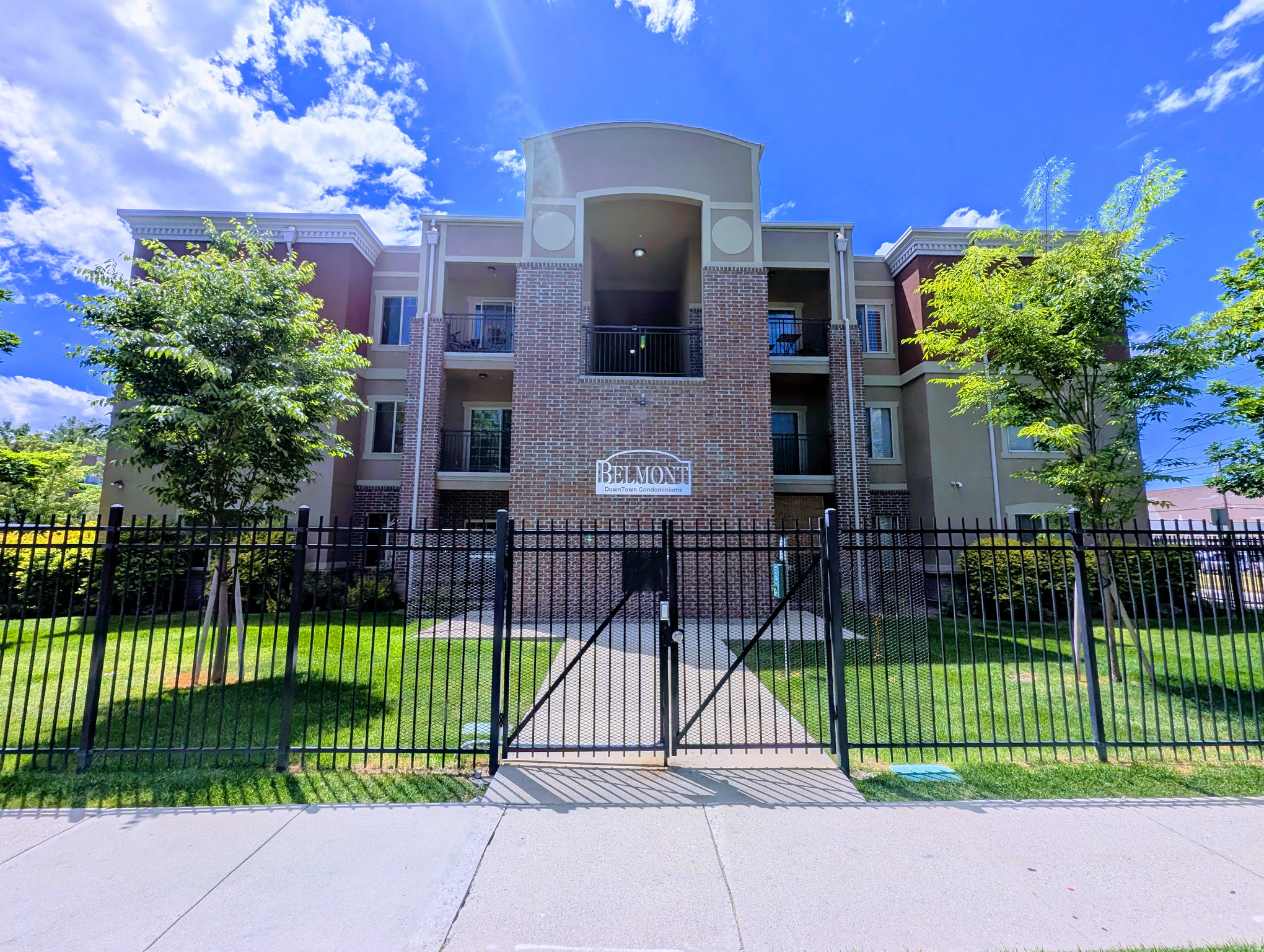 Welcome home to Belmont Condominiums, ideally located near the highly sought-after 9th & 9th neighborhood and just minutes from the heart of downtown Salt Lake City. This beautifully updated top-floor condo offers 2 bedrooms, 2 full bathrooms, and approximately 1,094 square feet of stylish, contemporary living space designed for comfort and convenience.  Step inside to discover an open and inviting floor plan featuring 9-foot ceilings, fresh paint, new carpet, and a spacious family room highlighted by a striking brick accent wall. The beautifully upgraded kitchen is perfect for entertaining, showcasing granite countertops, stainless steel appliances, a gas oven, breakfast bar seating, maple cabinetry with upgraded hardware, brushed nickel fixtures, and designer lighting throughout.  The generous primary suite includes a luxurious ensuite full bathroom with bathtub and oversized tiled tiled shower surround. Additional features include central air conditioning, washer and dryer hookups, storage closet, and two-tone paint accents that enhance the home's modern appeal.  Enjoy beautiful mountain and city views and step outside to your private covered balcony, the perfect place to relax and unwind. The gated community offers added security and includes a dedicated covered parking stall, with additional parking available for guests and residents.  Belmont Condominiums are nestled near the center of it all, within walking distance to TRAX light rail, Liberty Park, local shops, restaurants, cultural venues, and some of Salt Lake City's best dining and entertainment options. Whether you're commuting, exploring the city, or enjoying the vibrant neighborhood atmosphere, this location is hard to beat.  As an added bonus, eligible buyers may qualify for Utah's $25,000 First-Time Homebuyer Assistance Program. Don't miss this opportunity to own a stylish, move-in-ready condo in one of Salt Lake City's most convenient and desirable locations.   Property is being sold as is.  Square footage figures are provided as a courtesy estimate only and were obtained from County tax records .  Buyer is advised to obtain an independent measurement.