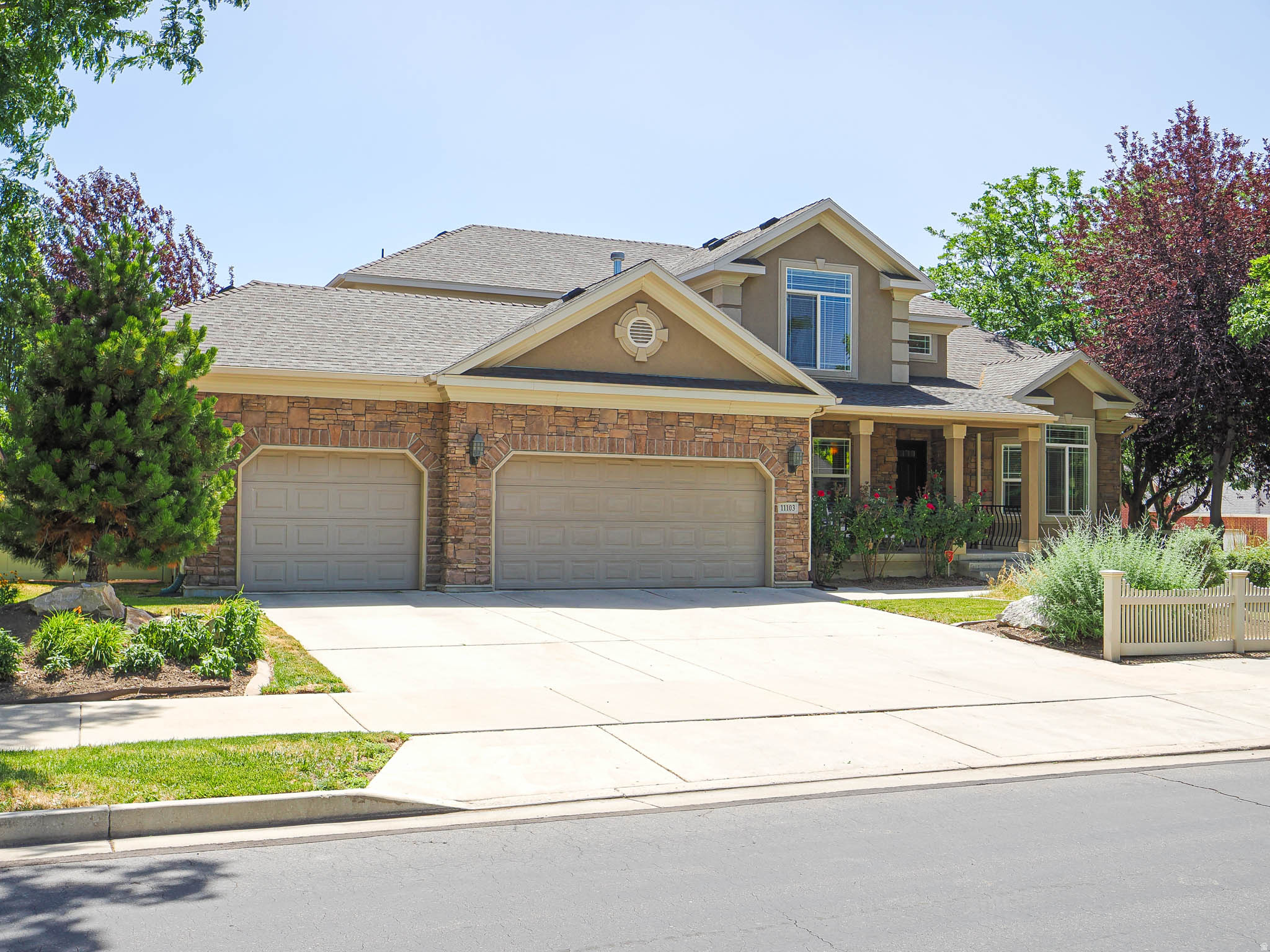 This Incredible home is perfectly nestled in the Ivory Crossing neighborhood with beautiful tree-lined streets and a very short walking distance to two community pools, a playground, and a clubhouse! | Inside features a wonderful open layout with large windows, 2-story vaults, a beautiful fireplace, and a huge main level primary suite complete with a separate jetted tub & shower w/ Rain head & shower jets, double sinks, and large walk-in closet | Huge open kitchen with ample cabinetry, a large island, corner pantry, stainless-steel appliances, gas range, and French-door fridge | Heading upstairs you'll find two large bedrooms, a full bathroom, and a loft overlooking the main level family room | Amazing, fully finished basement is equipped with a large wet bar w/fridge, microwave, and huge island; a second gas-log fireplace, family room, exercise room, office, additional bedroom, and another full bathroom | Maple hardwood floors and travertine tile add a touch of elegance and functionality to high traffic areas | Private backyard with beautiful mature landscaping, trex deck, flagstone patio, and gas line for grilling | Metal overhead storage in garage to be included | Save money on cooling with a whole house attic fan upstairs installed in 2023 | Amazing location just minutes from The District shopping center to the South and Costco and additional shopping and restaurants to the North | Easy access to Bangerter Hwy & Mountain View Corridor | Under 10 min drive to I15 and access to world-class ski resorts and all that Salt Lake City has to offer!