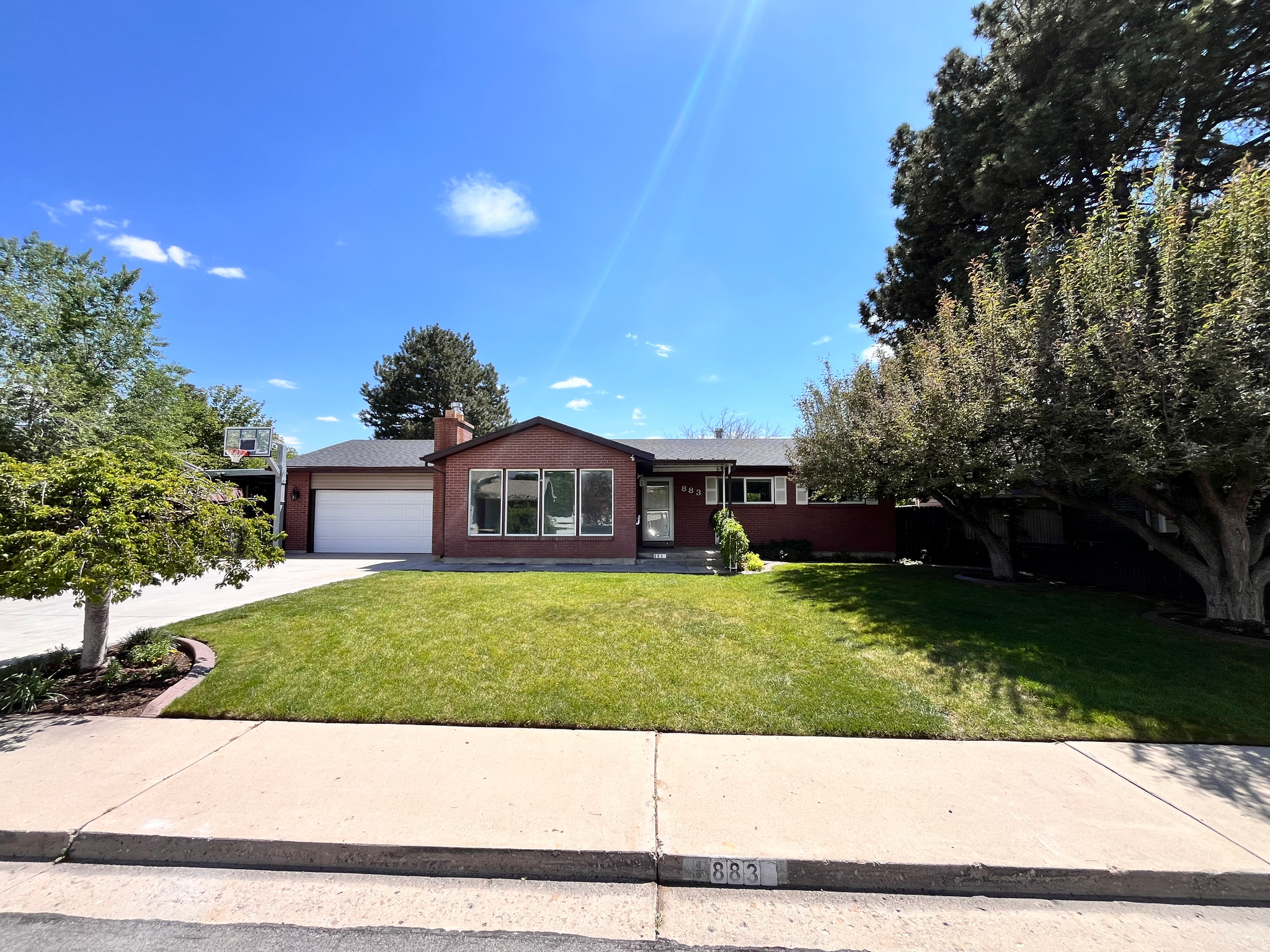 Newly remodeled home in a wonderful neighborhood. Beautiful yard with mature fruit trees, slide, swingset, patio and gazebo. Large storage shed and carport. Come see this beautiful gem in the heart of Orem.  Square footage figures are provided as a courtesy estimate only. Buyer is advised to obtain an independent measurement.