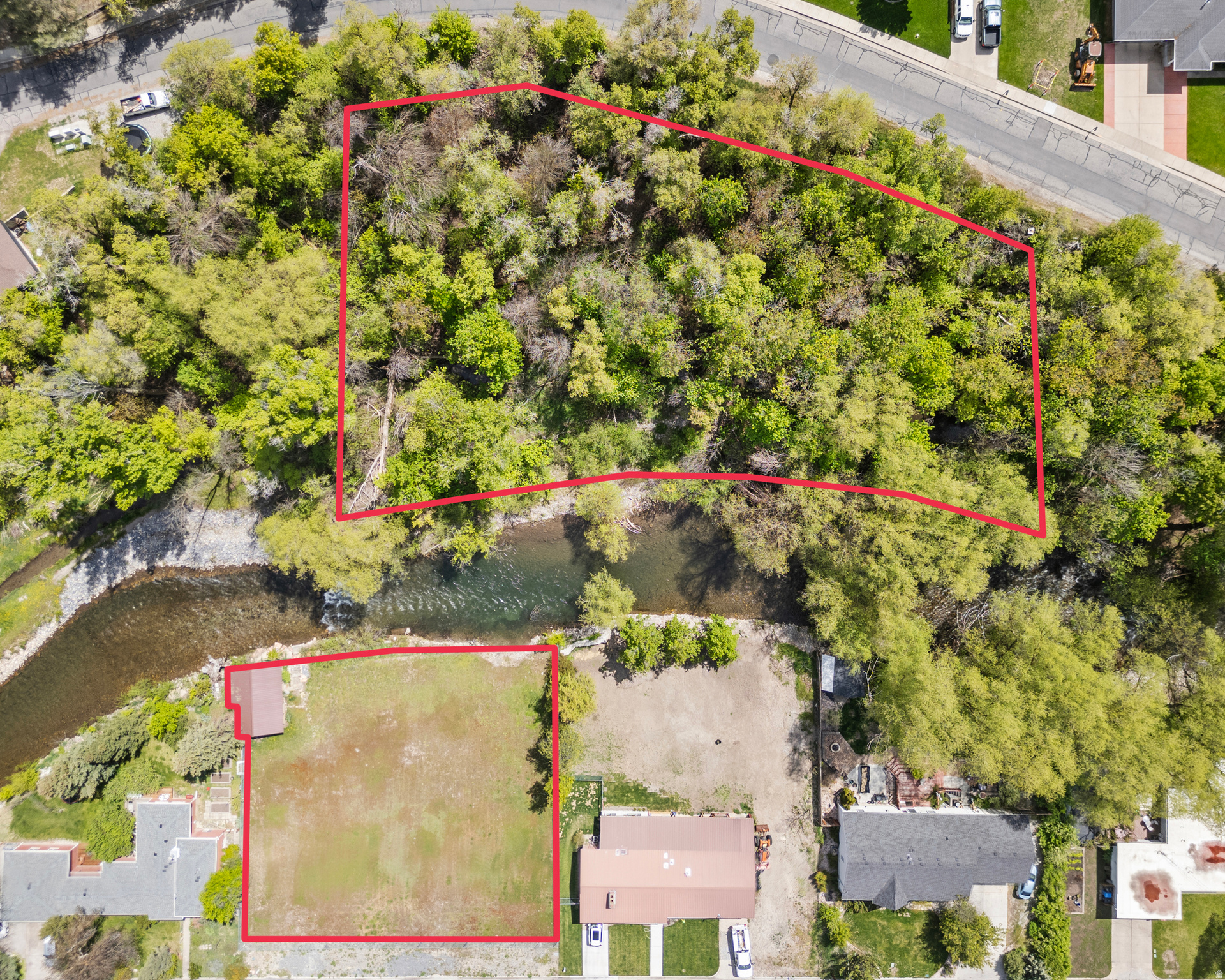 Amazing Logan river property! Located on 300 S in Logan.  This .39 lot used to have 2 homes on it that were demolished 4-5 years ago and the lots combined into one. You could go back and have the 2 tax ID numbers and 2 lots instead of the large one if desired. This also includes almost 2 acres on the other side of Logan River making this a true "oasis in the middle of the city".  This property awaits your imagination as to the retreat you would like to build on this property. River frontage on both side of the Logan river? Find that available anywhere else in the last 50 years!  You could build one estate house on the large .39 lot with the Logan river as the south border or maybe build  2 smaller homes again on the 2 original lots both having River frontage. There is an existing "old fishing cabin" right on the edge of the river that has a covered patio that you can kick back and relax as you listen to the sound of the Logan river or fish from!