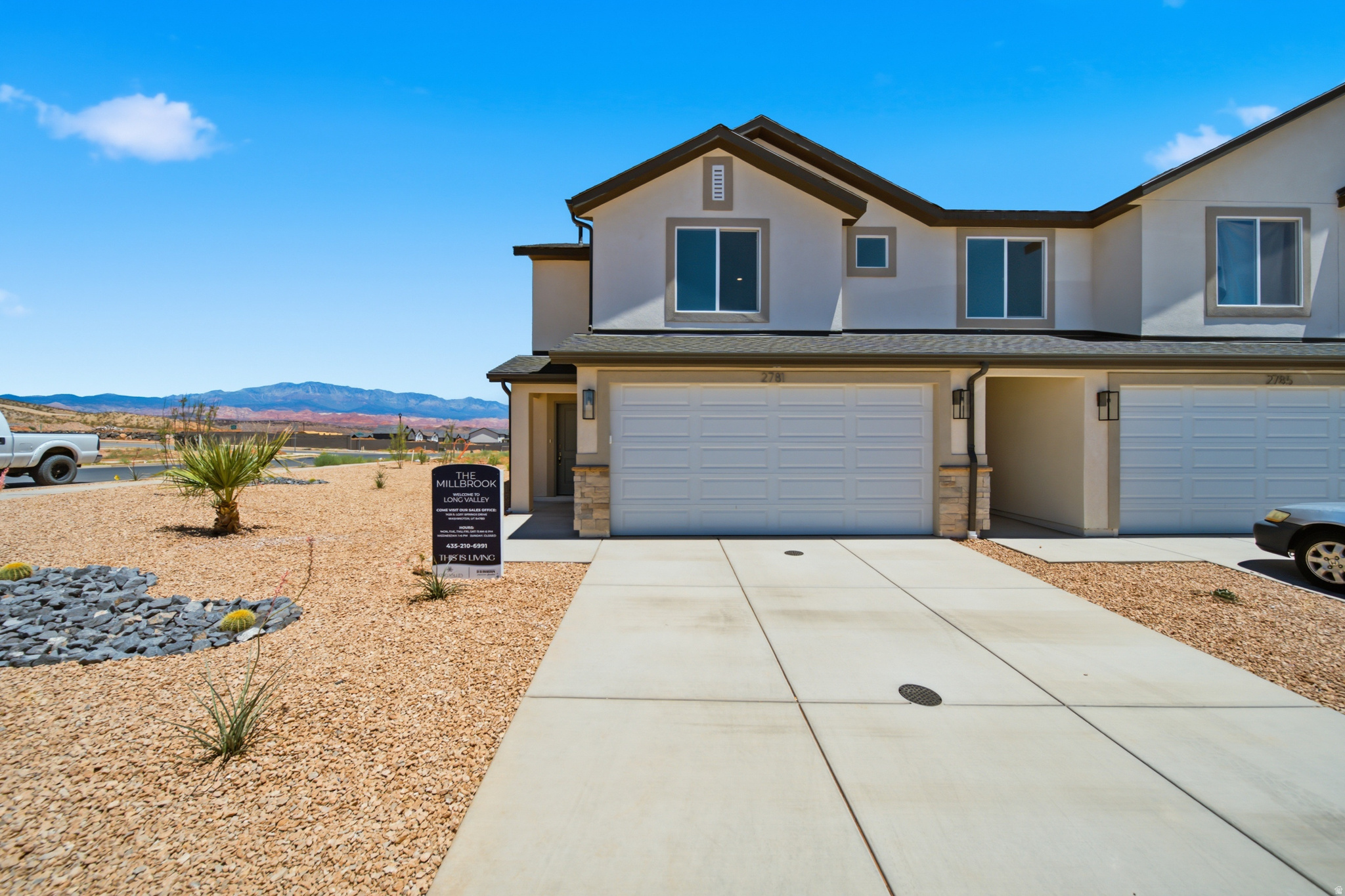 Welcome to a Millbrook End Unit in desirable Long Valley! This thoughtfully laid out floor plan has 3 bedrooms, 2.5 baths, and a 2-car garage. Long Valley features amazing amenities that include swimming pools, hot tub, pickleball courts, playground, movie lawn, terra-park, trails, and so much more! The home is equipped with smart home technology, is on Dixie Power, and is energy efficient, adding even more value to your purchase! Pictures are of a model of similar floor plan, actual finishes, upgrades, or elevation may vary. Square footage is provided as a courtesy.