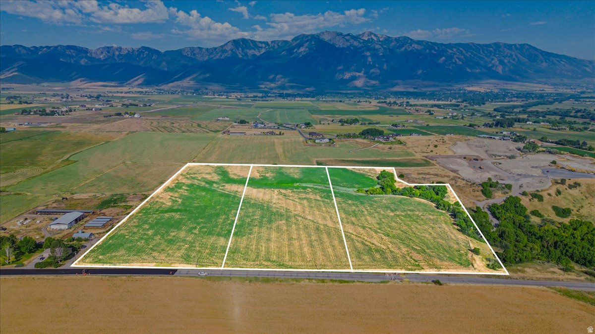Rare opportunity to own three adjoining Skyline Meadows building lots sold together as one package! This offering includes Lot 1 (10.27 acres), Lot 2 (10.34 acres), and Lot 3 (12.82 acres) for a total of 33.43 acres. Whether you're looking to create a private estate, establish a family compound, or live alongside friends while each enjoying your own homesite, the possibilities are endless. Each lot includes an approved well permit and has completed and passed a perc test, saving valuable time as you plan your build. The property features level, usable terrain, making it ideal for building, while offering breathtaking panoramic views. Located just seconds from Hyrum Reservoir, you'll enjoy easy access to boating, fishing, paddle boarding, camping, and countless other outdoor recreation opportunities. Experience the perfect balance of privacy, wide-open space, and convenience in one exceptional offering.