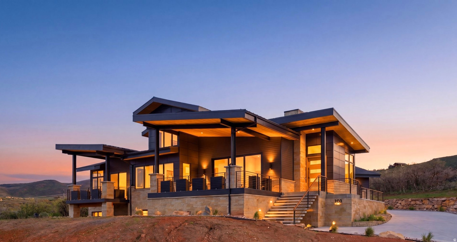 Enjoy elevated mountain living in this exceptional Hideout retreat perched above the Jordanelle with sweeping views of Deer Valley and Mt.Timpanogos. Newly completed and beautifully furnished, this custom mountain contemporary home oers three levels of thoughtfully designed living space where every window captures a postcard-worthy backdrop. Designed with comfort and functionality in mind, the home features approximately 2,600 square feet of main-level living, creating the ease of a true single-level lifestyle without sacrificing space for family or guests. The main floor includes a stunning primary suite, dedicated oce with dual workstations, expansive great room with fireplace, powder bath, laundry, and a chef's kitchen outfitted with professional-grade appliances, oversized island, wine fridge, and generous dining area. Walls of glass open to a spacious view deck ideal for morning coee, aprs-ski gatherings, or sunset entertaining. The upper and lower levels provide flexibility for hosting and multi-generational living. Upstairs, a cozy sitting room framed by spectacular views connects two spacious ensuite guest bedrooms. Downstairs, entertainment takes center stage with a large family room, wet bar, game area, sauna, flex space ideal for a gym or movie room, an oversized ensuite guest suite, and a fun custom bunk room. Outside, enjoy landscaped outdoor living spaces and a private hot tub on an expansive back deck. A sophisticated blend of stone, wood, and metal complements the surrounding landscape, while practical luxuries include central A/C, three furnaces, and a 3-car garage ready for all your mountain gear. Located just 12 minutes from Deer Valley East Village, 17 minutes to Historic Park City Main Street, and 45 minutes from Salt Lake International Airport, world-class skiing, golf, boating, biking, hiking, and fishing are all moments away. This is mountain living at its finest-elevated, eortless, and designed for both relaxation and adventure.
