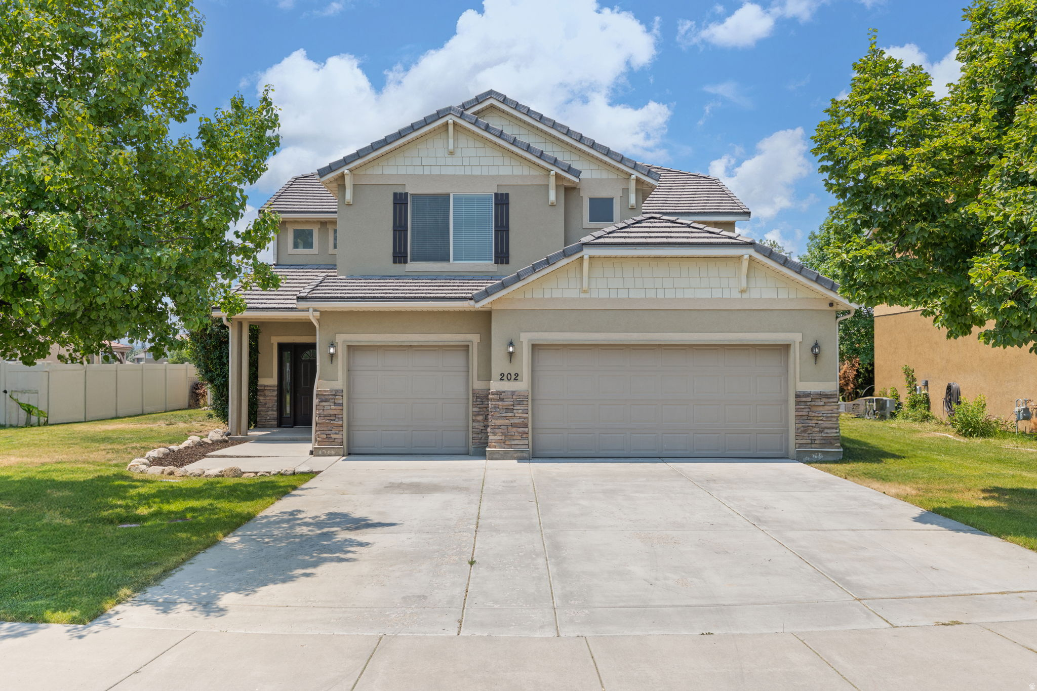 Welcome home! This stunning 4-bedroom, 3-bathroom home is priced to sell. With 2,699 square feet of beautifully updated living space in the heart of Lehi. Every detail has been taken care of so you can move right in. From the moment you walk through the front door, the dramatic vaulted entry captures your attention with soaring ceilings that flood the space with natural light and create an open, airy feel that makes the home live even larger than it looks. A versatile main-level flex space offers the flexibility to be used as a home office, a fourth bedroom, or a quiet retreat to suit your needs. Brand new carpet and fresh paint throughout mean this home is clean, crisp, and completely ready for its next chapter. The location is just as impressive as the home itself. Lehi's fantastic trail system is right outside your door, perfect for morning runs, evening walks, or weekend adventures. You are also just minutes from Utah's Silicon Slopes tech hub, top rated Alpine School District schools, Thanksgiving Point, and easy I-15 access to both Salt Lake City and Provo. This is the one you have been waiting for. Updated, move in ready, and in a community that truly has it all.