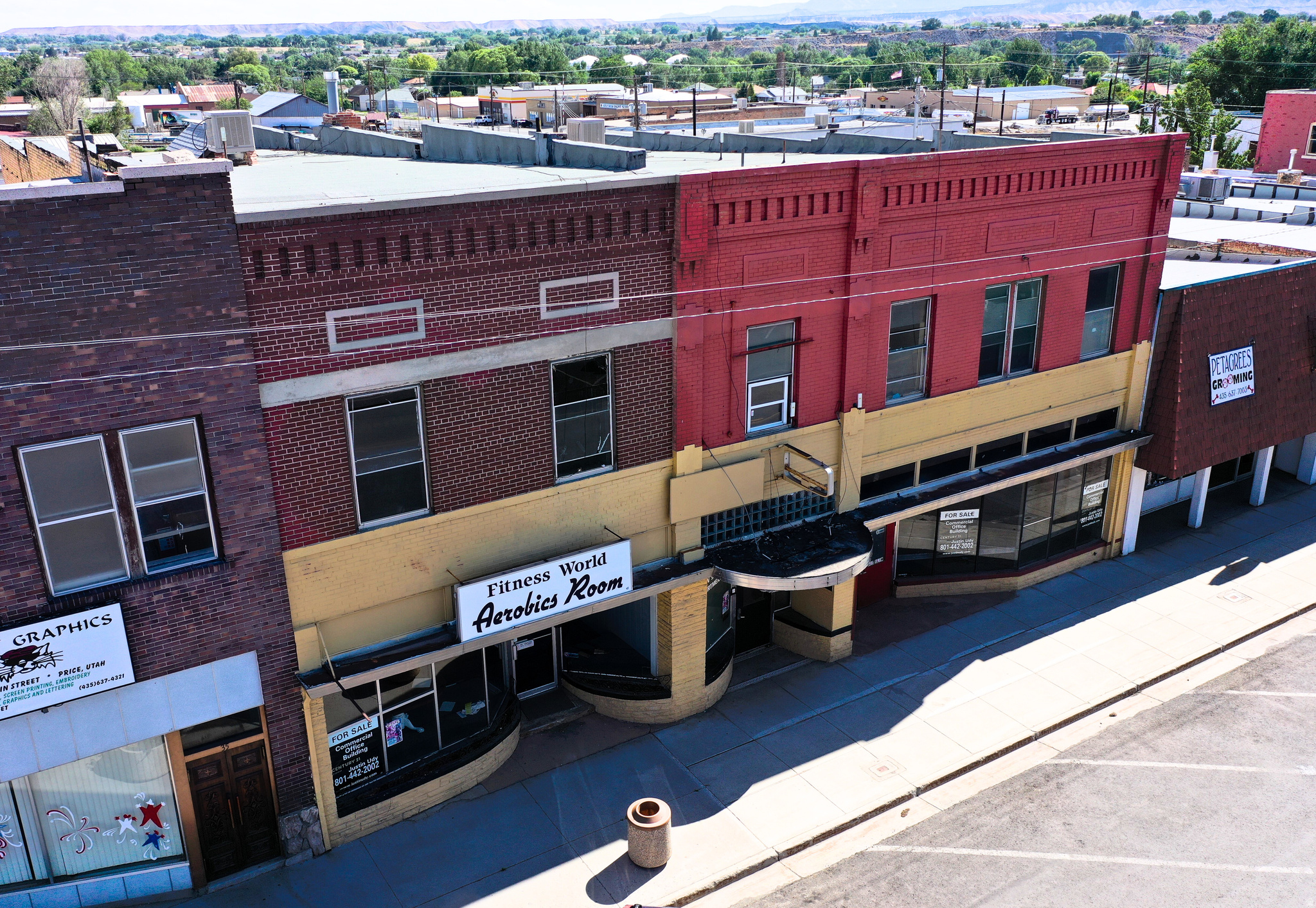 Historic Downtown Redevelopment Opportunity  An exceptional opportunity to re-imagine a history-rich Main Street landmark in the heart of downtown Price. Built in 1910, this iconic three-level commercial building offers nearly 17,709 square feet of total space and unlimited potential for the right investor with vision.  Each level spans approximately 5,903 square feet, providing a solid footprint for a mixed-use redevelopment. The main level features two large retail spaces, each with separate exterior entrances (approximately 3,000 sq ft and 1,800 sq ft), along with a dedicated lobby entrance for the upstairs apartments. The spaces are independent and do not connect, offering flexibility for multiple tenants.  The basement level is divided into three separate sections, each accessed by its own entrance, creating additional opportunities for storage, utility, tenant use.  The upper level spans the full dimensions of the building and was originally designed to house 29 studio apartments. This level presents an outstanding opportunity for long-term rentals, short-term rentals, or Airbnb-style accommodations.  The property is currently in the demolition phase and is being sold as-is. It requires substantial renovation. However, this phase creates a rare blank-slate.  Notably, the owner previously had professional renovation plans drafted for the entire building. These plans are available and may be purchased separately, offering a significant head start on redevelopment.  Additional highlights include Main Street frontage, on-street parking, and rear parking access, beautiful original interior brick is exposed.  This is a rare chance to restore and transform a historic downtown structure into a standout mixed-use investment. With the right vision, this building has the potential to become one of downtown Price's most impressive and profitable properties.  Endless possibilities. Historic character. Unmatched potential. Square footage figures are provided as a courtesy estimate only. Buyer is advised to obtain an independent measurement.