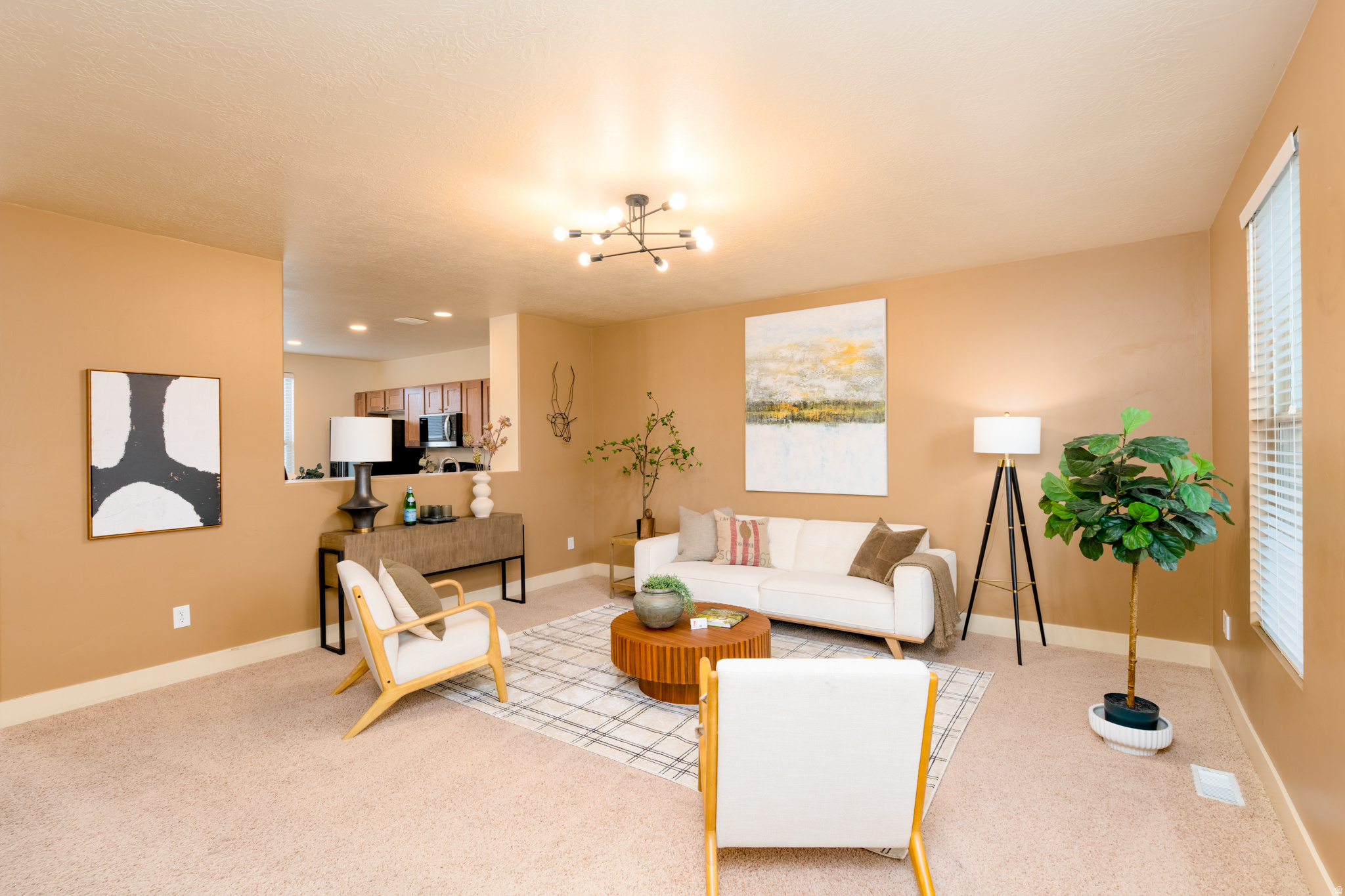Welcome home to living the Daybreak way in East Lake Village! With so many amenities within 5 minutes, it creates a lifestyle where you can enjoy recreation, dining, grocery shopping, and more without having to leave Daybreak. All the included amenities provide over $700 of value every month, including high-speed internet.  This modern townhome is in excellent condition and still feels new. It's a place you can  Featuring large living/family rooms, vaulted ceilings, upgraded modern lighting, tons of granite kitchen countertop & cabinet space; the gas range & refrigerator are included.  The large kitchen and private backyard space are perfect for entertaining or unwinding at the end of the day.  The neighborhood is pristine, has tree-lined streets & offers mountain views including Kennecott. Learn more about the HOA and life in Daybreak https://www.mydaybreak.com/ https://www.daybreakliving.com/ https://www.daybreakutah.com/ Seller offering $30,000 to pay off HOA assessment, or provide seller-paid concessions, or a mix of both.  Square footage figures are provided as a courtesy estimate only and were obtained from county records.  Buyer is advised to obtain an independent measurement.