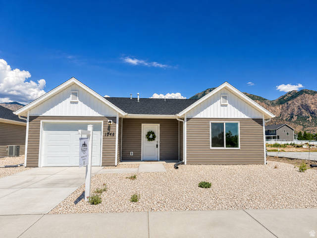 Refrigerator, Washer, and Dryer, included! This brand-new patio home offers the low-maintenance lifestyle buyers have been searching for without sacrificing quality, comfort, or location. Designed for easy single-level living, this thoughtfully crafted home features an open floor plan, quartz countertops, a walk-in closet, an attached garage with a smart opener, and beautiful mountain views right outside your door. Located in the highly desirable new community, you'll enjoy landscape maintenance done for you, along with walking trails, biking paths, parks, picnic areas, and pickleball courts. Whether you're downsizing, simplifying, or just tired of spending weekends on yard work, this is the lifestyle upgrade you've been waiting for. The best part? Everything is brand new. No outdated finishes. No expensive repairs. No projects waiting for you after closing. Just move in and enjoy. HOA Maintains -Pickleball Courts, Walking & Biking Trails, Open Green Space, Community Gathering Areas, Snow Removal, and Common Area Maintenance.