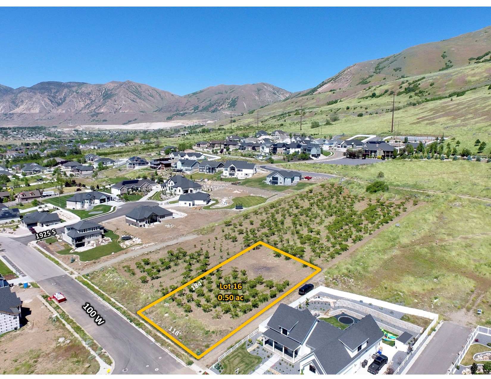 1/2-acre building lot in the beautiful community of Perry featuring breathtaking mountain and valley views. No HOA and no required timeframe to begin construction! Excellent opportunity to bring your own builder, hold for a future custom home, or purchase as an investment. The adjoining 1 acre lot directly behind is also available and listed, creating an opportunity to combine both for a truly stunning estate with unmatched views and additional space. Conveniently located near mountain recreation, Northrop Grumman, I-15, Hill Air Force Base, and Willard Bay State Park.  Agent owned