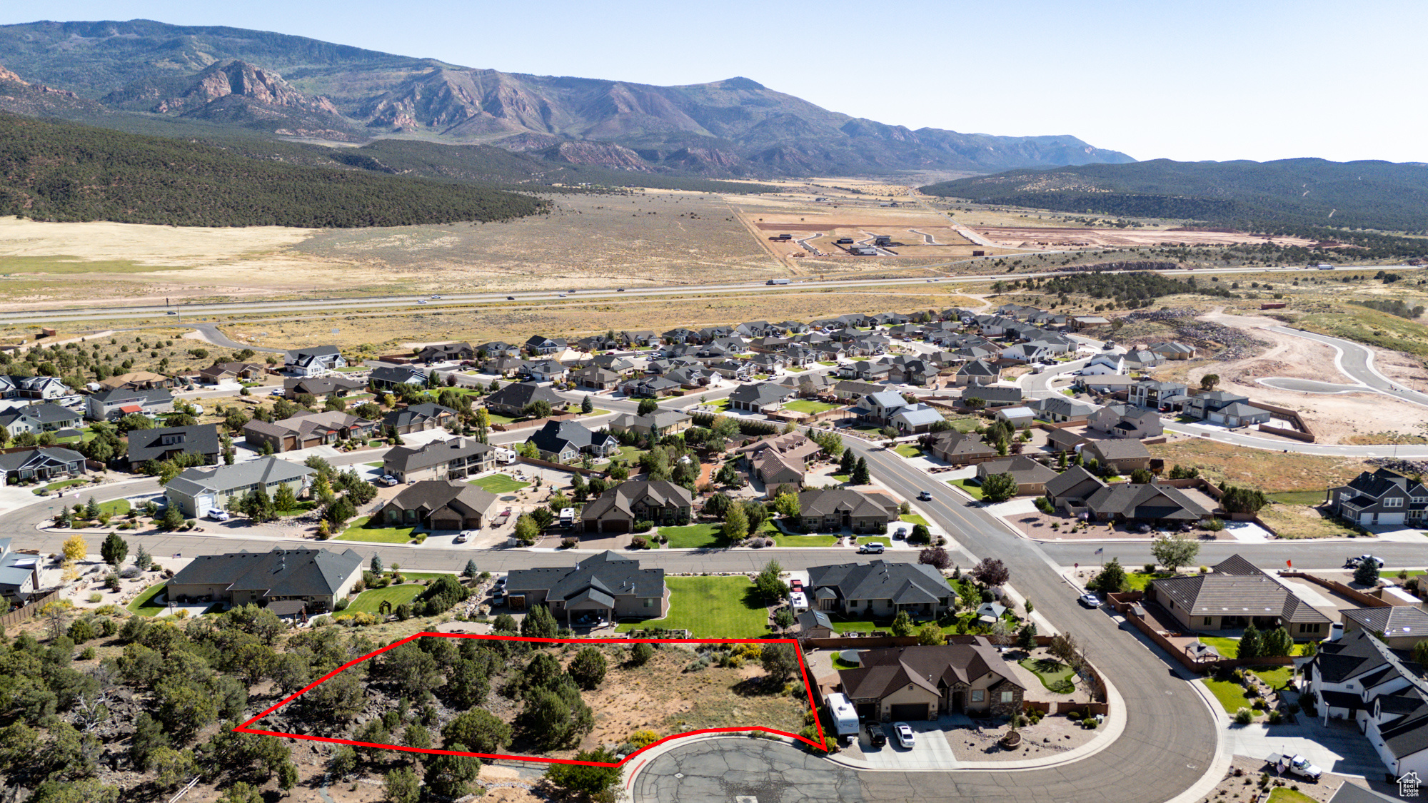 This is the lot you've been waiting for! Gorgeous 0.51-acre parcel located in a quiet, established cul-de-sac in the desirable Eagle Ridge at South Mountain subdivision. Enjoy unobstructed and unsurpassed views of the coral cliffs of Shurtz Canyon-a stunning backdrop for your dream home.  This is currently the only lot for sale in the subdivision, making it a rare opportunity. No HOA fees (CC&Rs in place to protect neighborhood aesthetics). Impact fees and water connection not paid by seller, offering flexibility for future construction.  Custom home plans specifically designed for this lot are available and can be included with lot purchase if desired.  Don't miss your chance to build in one of the area's most scenic and peaceful locations!