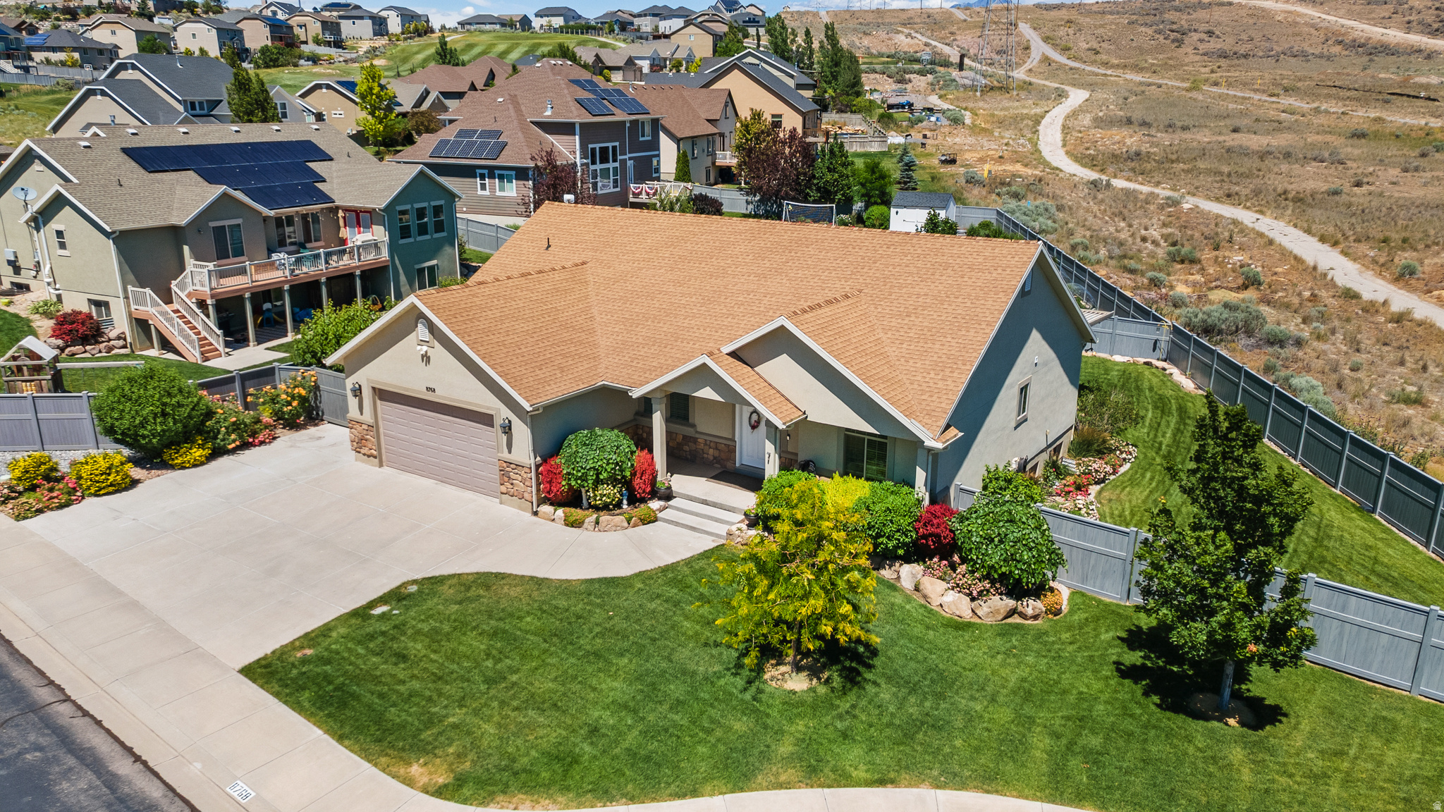 One of the cleanest listings I've seen. A MUST SEE! This custom built home showcases quality throughout with real hardwood floors, solid wood cabinetry, and a thoughtfully designed floor plan. Enjoy the massive covered patio 21x48 (over 1,000 square feet) overlooking a beautifully landscaped backyard and valley view, plus exceptional curb appeal in the front. Raised Garden beds in backyard and Permanent roofline lighting. Tucked into a quiet cul de sac with only a few homes, this property offers abundant parking, outstanding privacy, open space behind that won't be built on, and beautiful views from both the front and back. A rare opportunity to own a home that offers craftsmanship and quality that's difficult to find in many newer homes. Gas and electric hookups for both stove and dryer.
