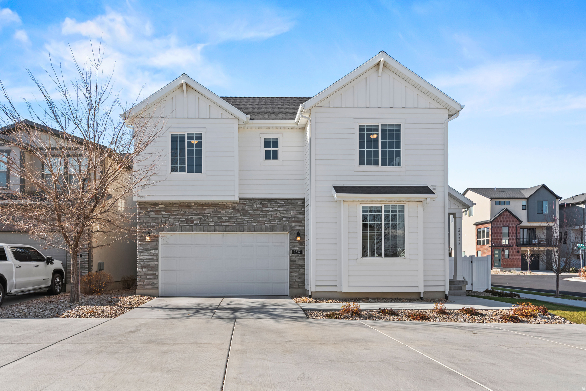 This stunning 6-bedroom, 4.5-bath single-family home is nestled in the highly sought-after Holbrook Farms community behind Thanksgiving Point in the heart of Silicon Slopes. Offering nearly 4,000 square feet of beautifully designed living space, this home features a grand two-story entry, an open-concept floor plan, a spacious family room with a cozy fireplace, and a gorgeous kitchen with quartz countertops, stainless steel appliances, a large island, and generous dining area-perfect for entertaining. The main-level primary suite offers a spacious retreat with a large walk-in closet and private ensuite shower, along with a convenient main-level laundry room and half bath. Upstairs you'll find three spacious bedrooms, loft, and a full bathroom. The fully finished basement offers exceptional flexibility with two bedrooms, two full bathrooms, a family room featuring a custom built-in entertainment center, and a second laundry hookup. Plumbing and electrical components for a future kitchen have already been roughed in and concealed within the walls, making it easy to add a kitchen. Conveniently located just minutes from Thanksgiving Point, Traverse Mountain, shopping, dining, I-15, and world-class tech employers, this home offers the perfect combination of luxury, flexibility, and unbeatable location.